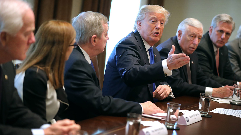 President Trump presides over a meeting about immigration with Republican and Democratic members of Congress at the White House on Tuesday. Congress and the White House are trying to work out an immigration deal prior to Jan. 19. (Chip Somodevilla/Getty Images)