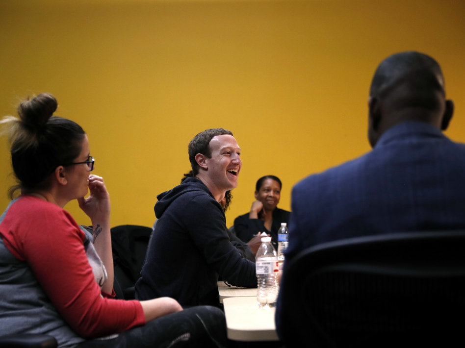 Facebook CEO Mark Zuckerberg laughs as he meets with a group of entrepreneurs and innovators during a roundtable discussion at Cortex Innovation Community technology hub, in November, in St. Louis. (Jeff Roberson/AP)
