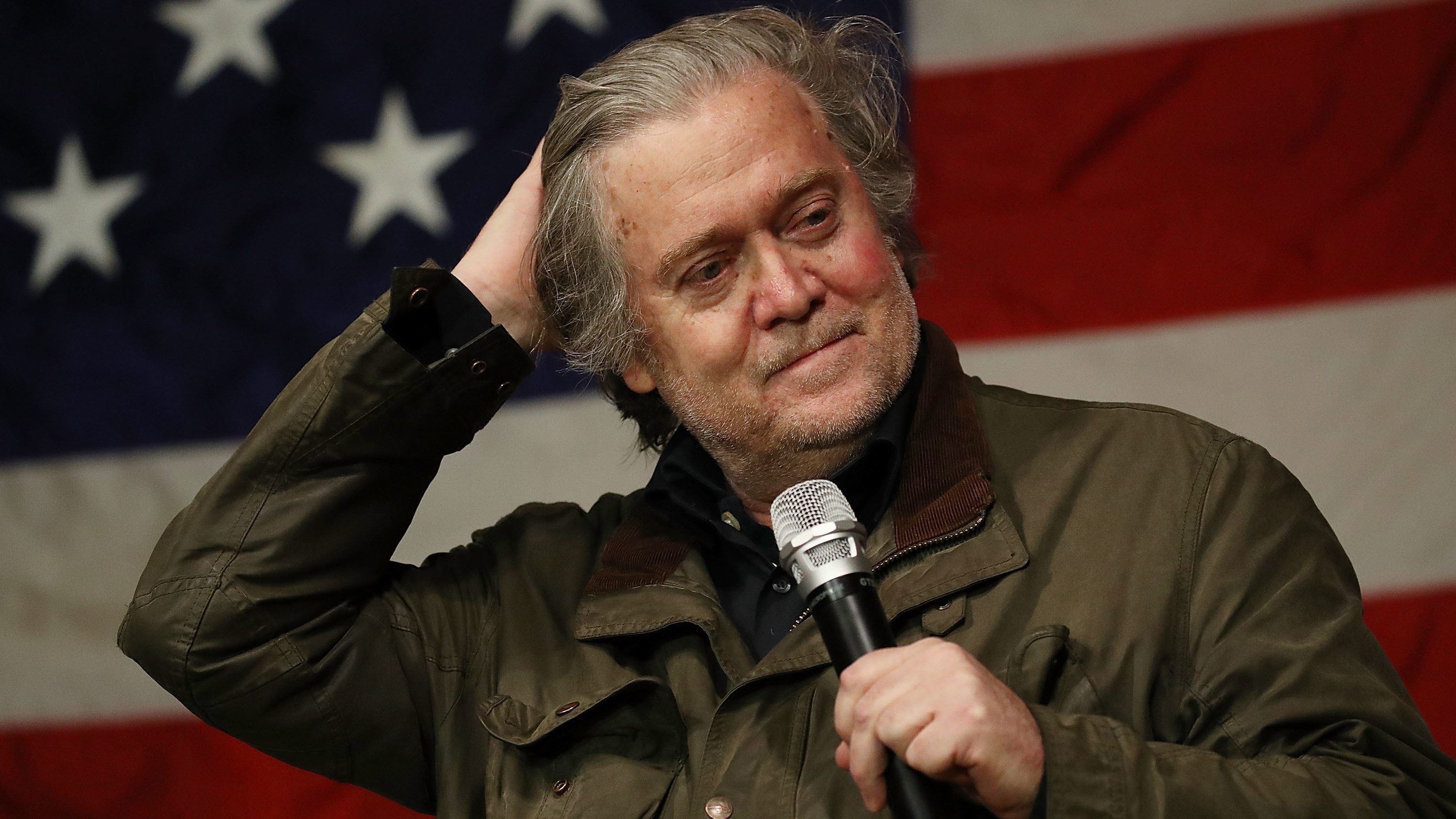 Steve Bannon speaks before introducing Republican senatorial candidate Roy Moore in December in Fairhope, Ala. Bannon now finds himself on the outs with the conservative website he once led and the White House administration where he had been a key player. (Getty Images)