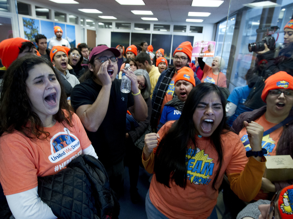 Demonstrators protest at Sen. Dean Heller's, R-Nev., office in support of the Deferred Action for Childhood Arrivals (DACA), and Temporary Protected Status (TPS), programs on Capitol Hill on Tuesday. (Jose Luis Magana/AP)