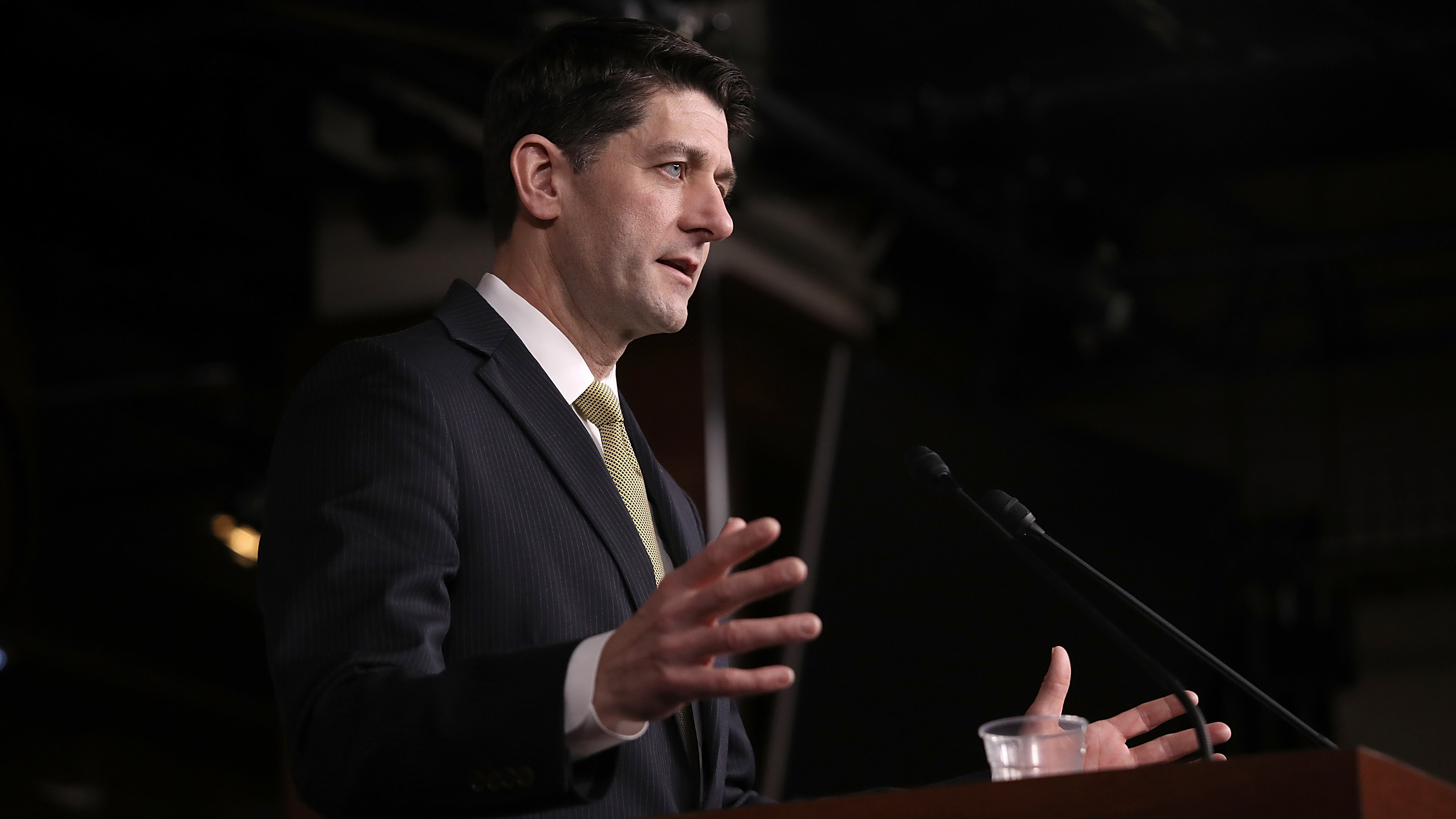 Speaker of the House Paul Ryan, R-Wis., answers questions Thursday on the possibility of a government shutdown. After receiving assurances from Ryan, a key group of conservative House Republicans said they would support a short-term-funding bill. (Getty Images)