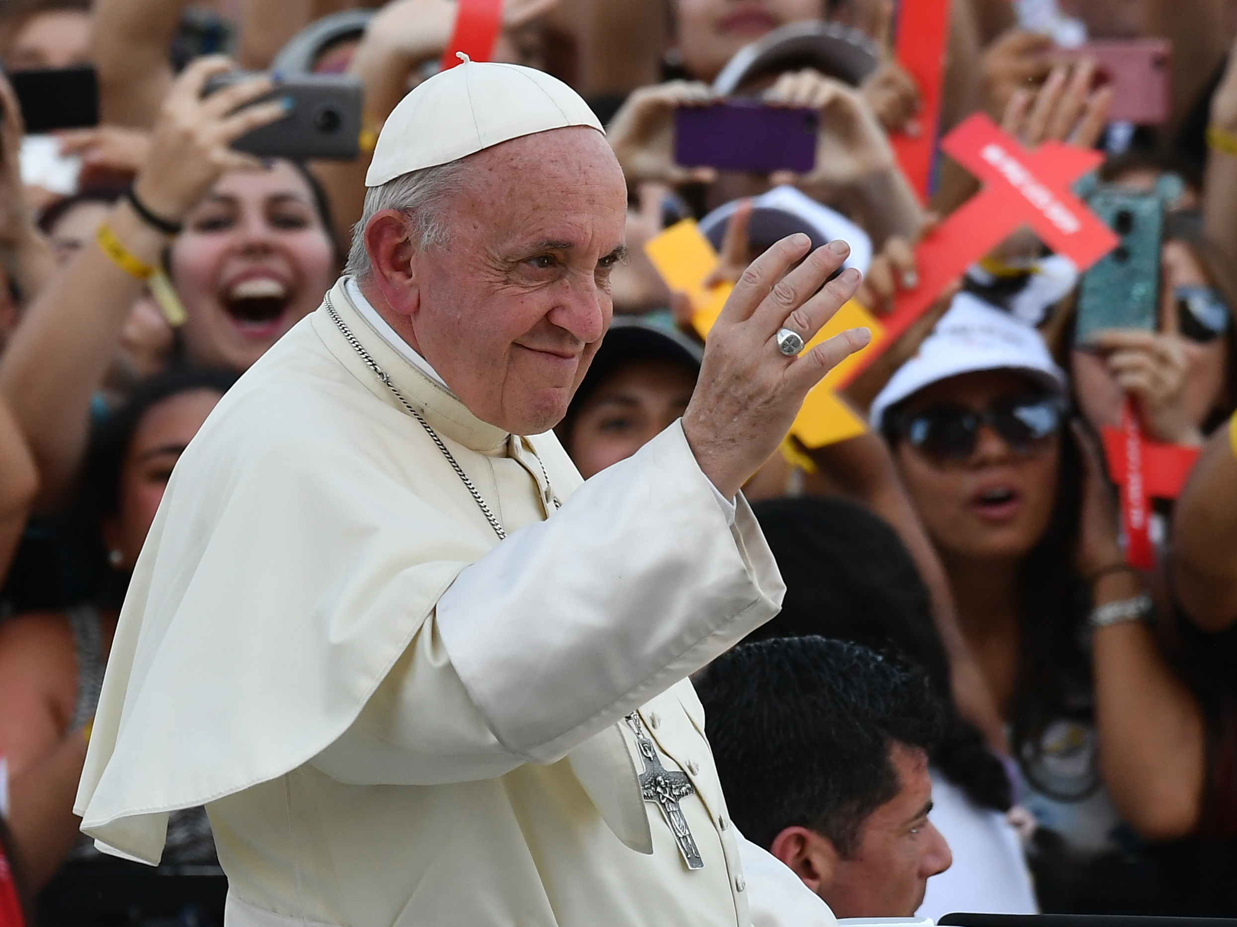 Pope Francis waves to a crowd as he arrives at the National Shrine of Maipu in Santiago, Chile, to meet with young people, on Wednesday. (AFP/Getty Images)