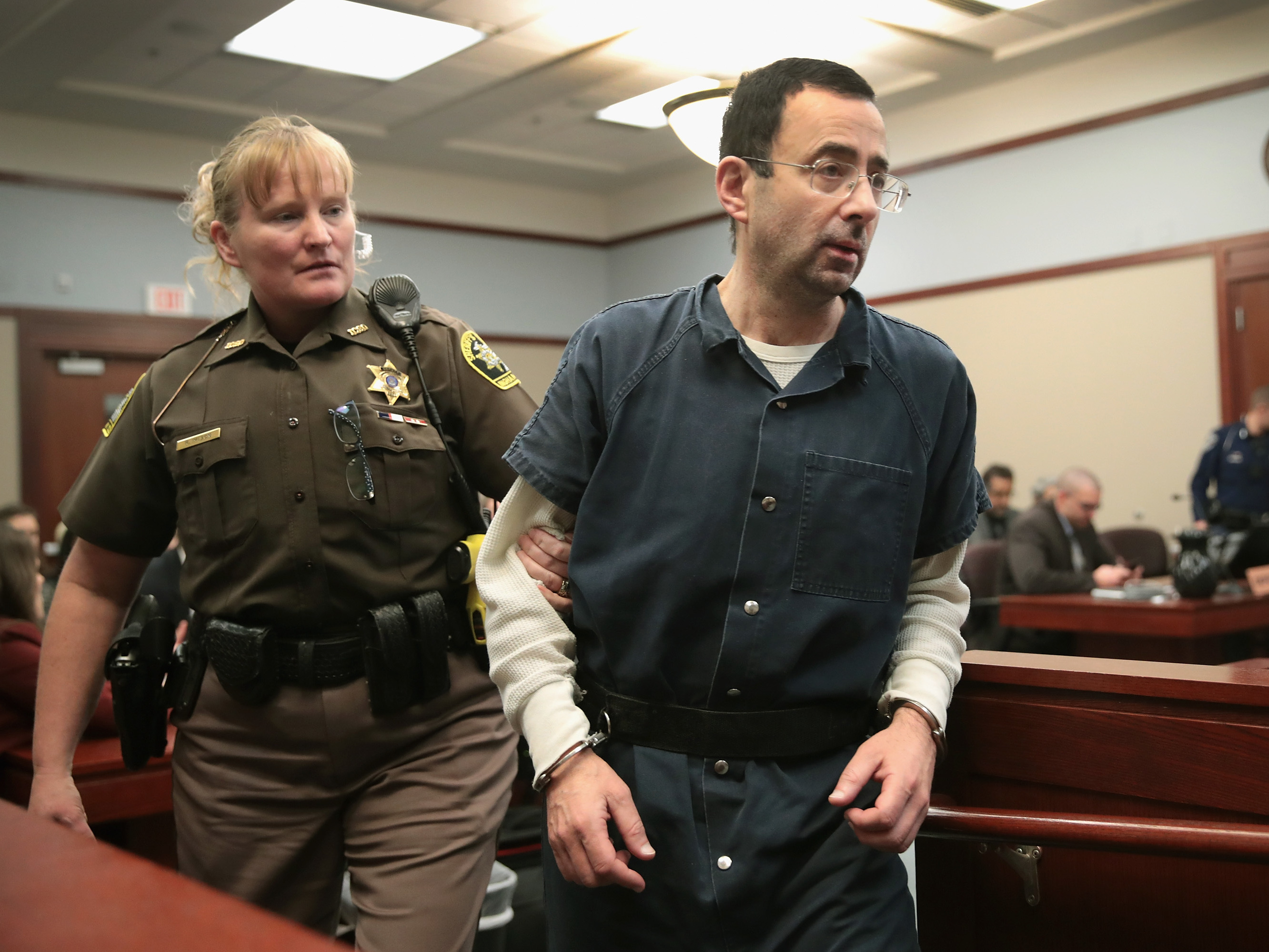 Larry Nassar appears in court last Wednesday in Lansing, Mich., to listen to victim impact statements during his sentencing hearing. He is accused of molesting more than 100 girls while he was a physician for USA Gymnastics and Michigan State University. (Getty Images)