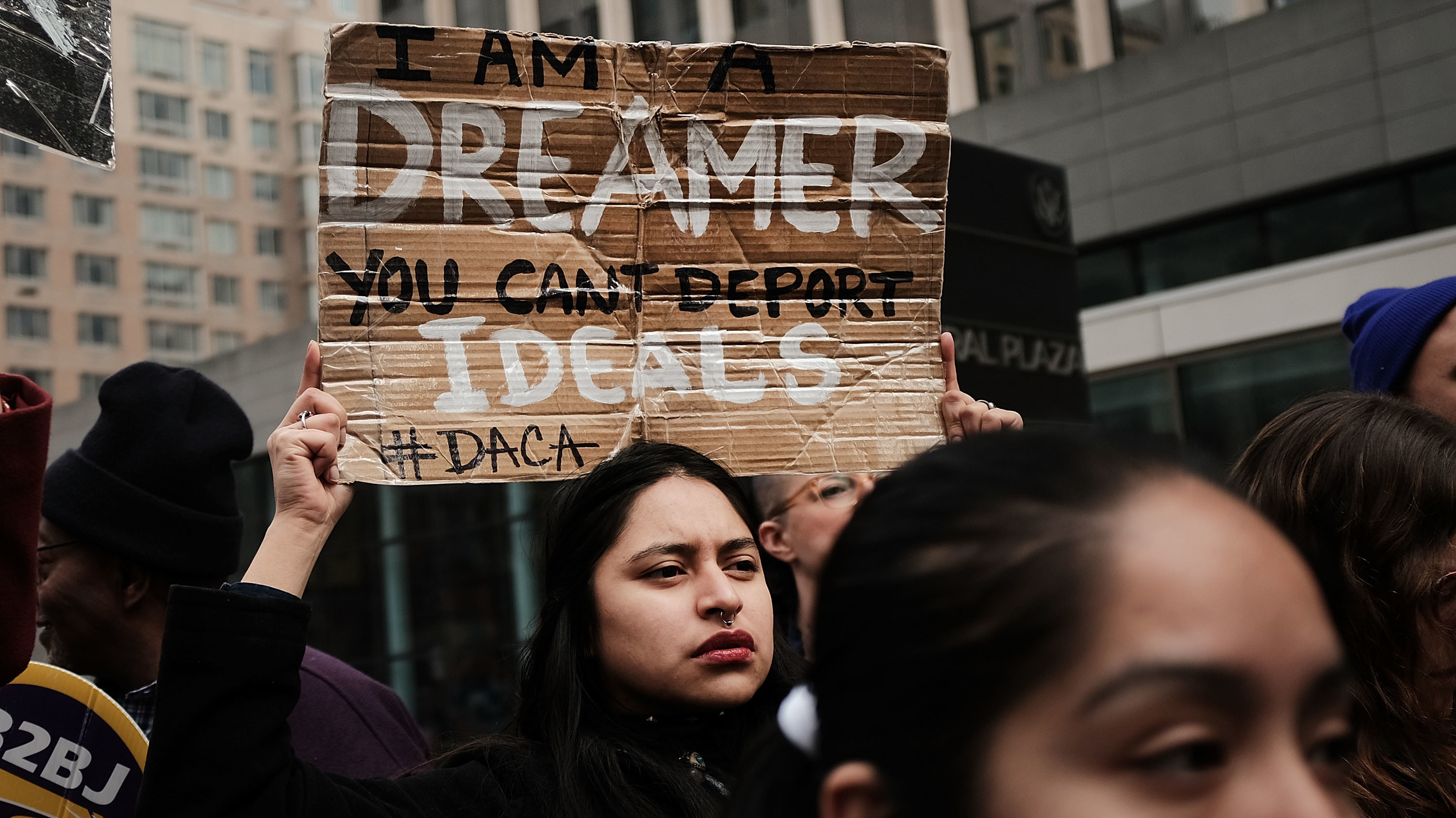 Demonstrators, many of them recent immigrants to America, protest the government shutdown and the lack of a deal on DACA (Deferred Action for Childhood Arrivals) outside of Federal Plaza in New York City on Monday. (Getty Images)