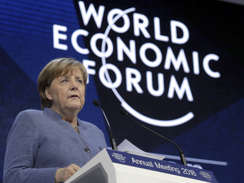 German Chancellor Angela Merkel addresses the World Economic Forum in Davos, Switzerland, on Wednesday. (Markus Schreiber/AP)