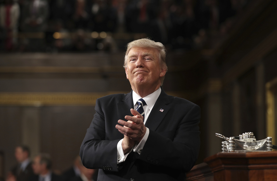 President Trump reacts after addressing a joint session of Congress in 2017. (Jim Lo Scalzo/AP)