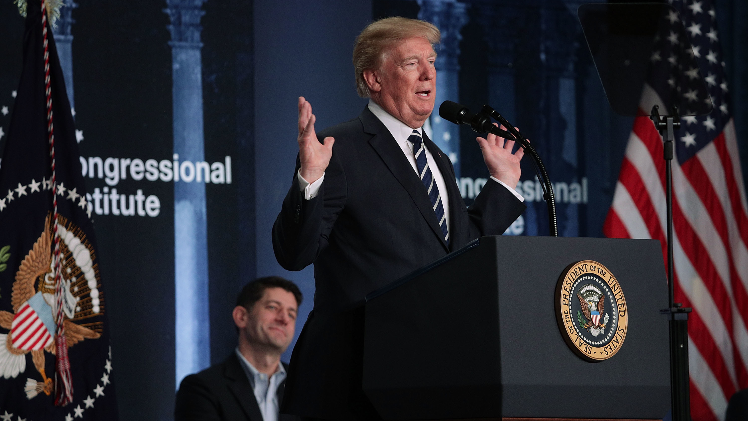 President Donald Trump  speaks as Speaker of the House Rep. Paul Ryan listens during a lunch at the 2018 House & Senate Republican retreat Feb. 1 at the Greenbrier resort in White Sulphur Springs, W. Va. (Getty Images)