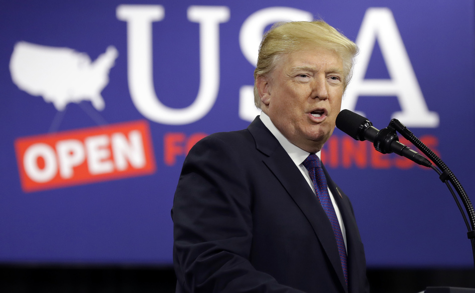 In a speech about tax policy in Blue Ash, Ohio, on Monday, President Trump accused Democrats of being "un-American" for not applauding during his State of the Union speech. (Evan Vucci/AP)