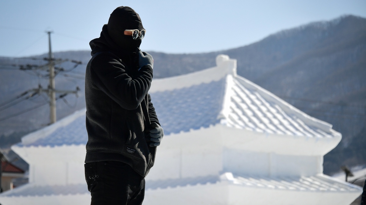 The Pyeongchang 2018 Winter Olympics Reverse A Recent Trend Of Relatively Warm Conditions At The Winter Games Here A Man Prepares To Work In Front Of An The Pyeongchang 2018 Winter Olympics Reverse A Recent Trend Of Relatively Warm Conditions At The Winter Games Here A Man Prepares To Work In Front Of An