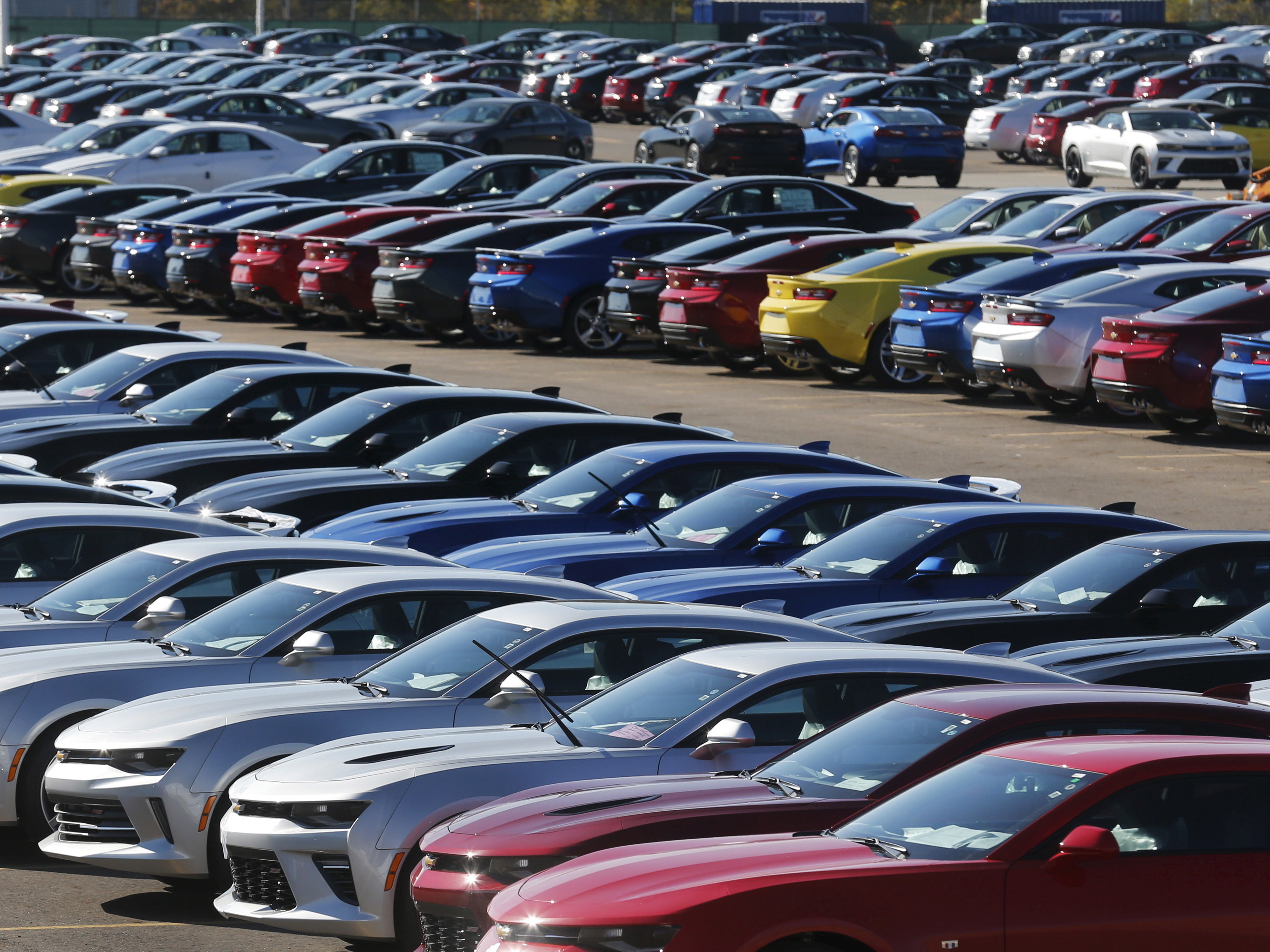 Chevrolet Camaros are lined up at General Motors' Lansing Grand River Assembly Plant in Michigan in 2015. Automakers in the U.S. say if costs go up as a result of a renegotiated NAFTA, they would be less competitive. (Reuters)
