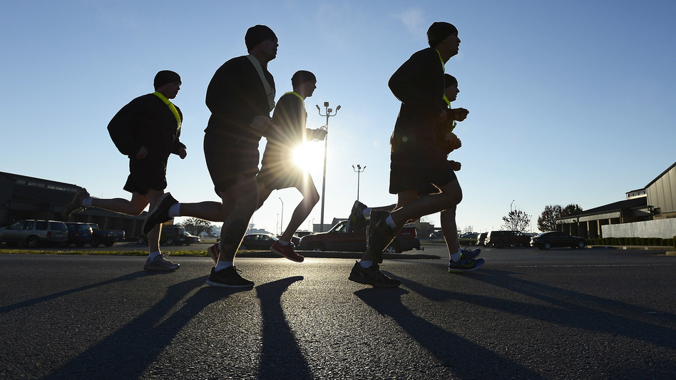 Members of the Pathfinders 5th Battalion, 101st Combat Aviation Brigade of the 101st Airborne Division, go for a run at Fort Campbell, Ky., in 2013. The Census Bureau says it will count deployed service members as residents of their home bases or ports for the 2020 census. (Mark Zaleski/AP)