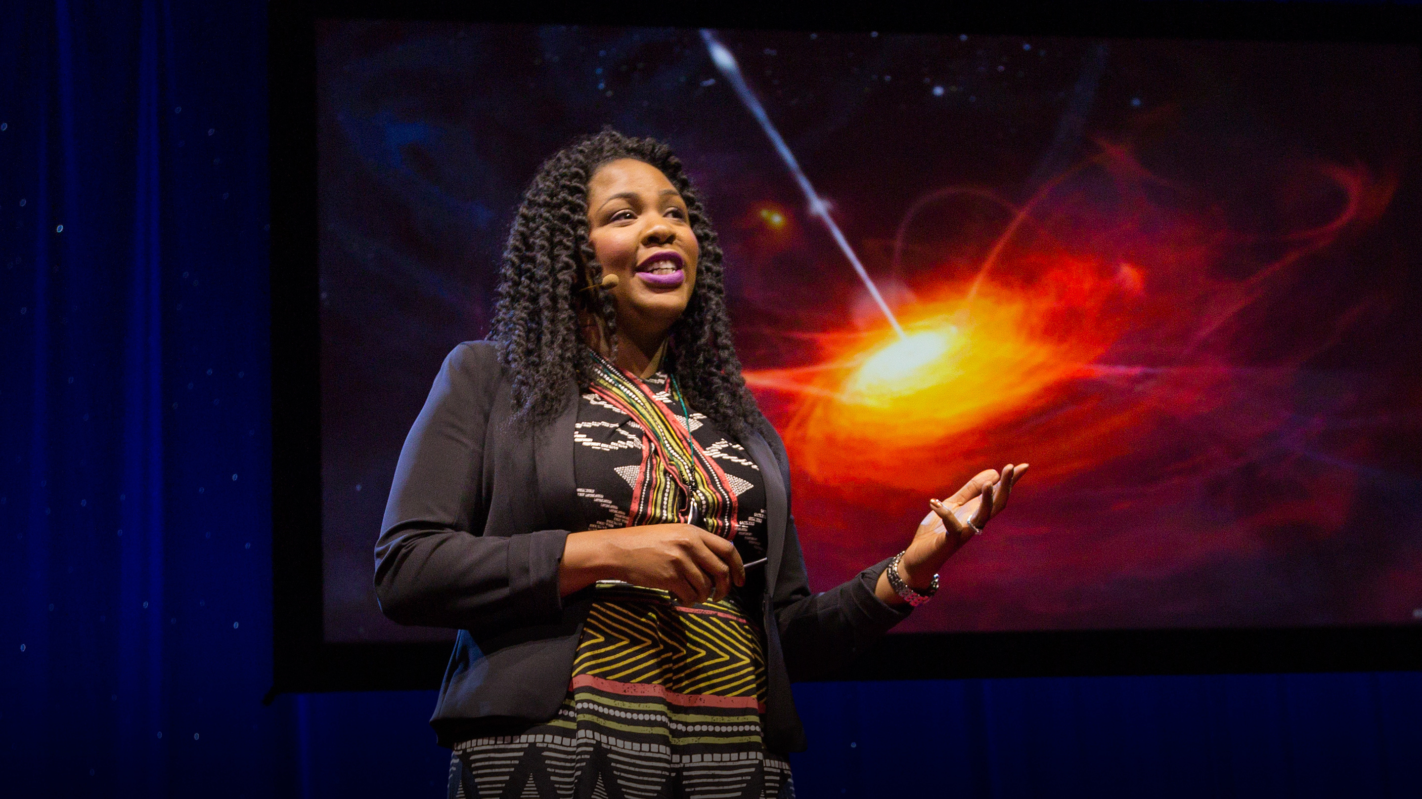 Jedidah Isler speaks on the TED stage.