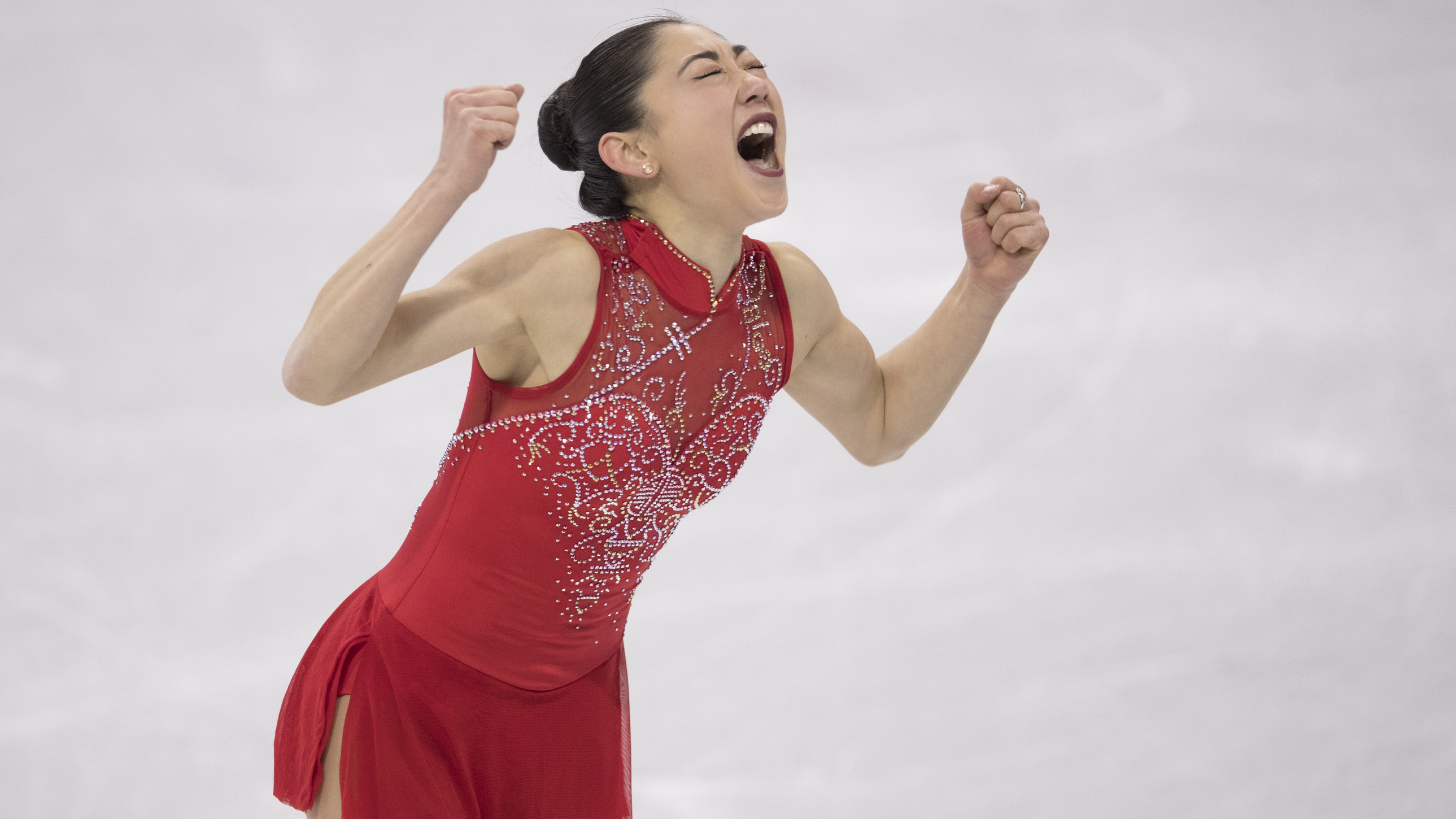 Mirai Nagasu exults after her performance on Monday in the U.S. figure skating team