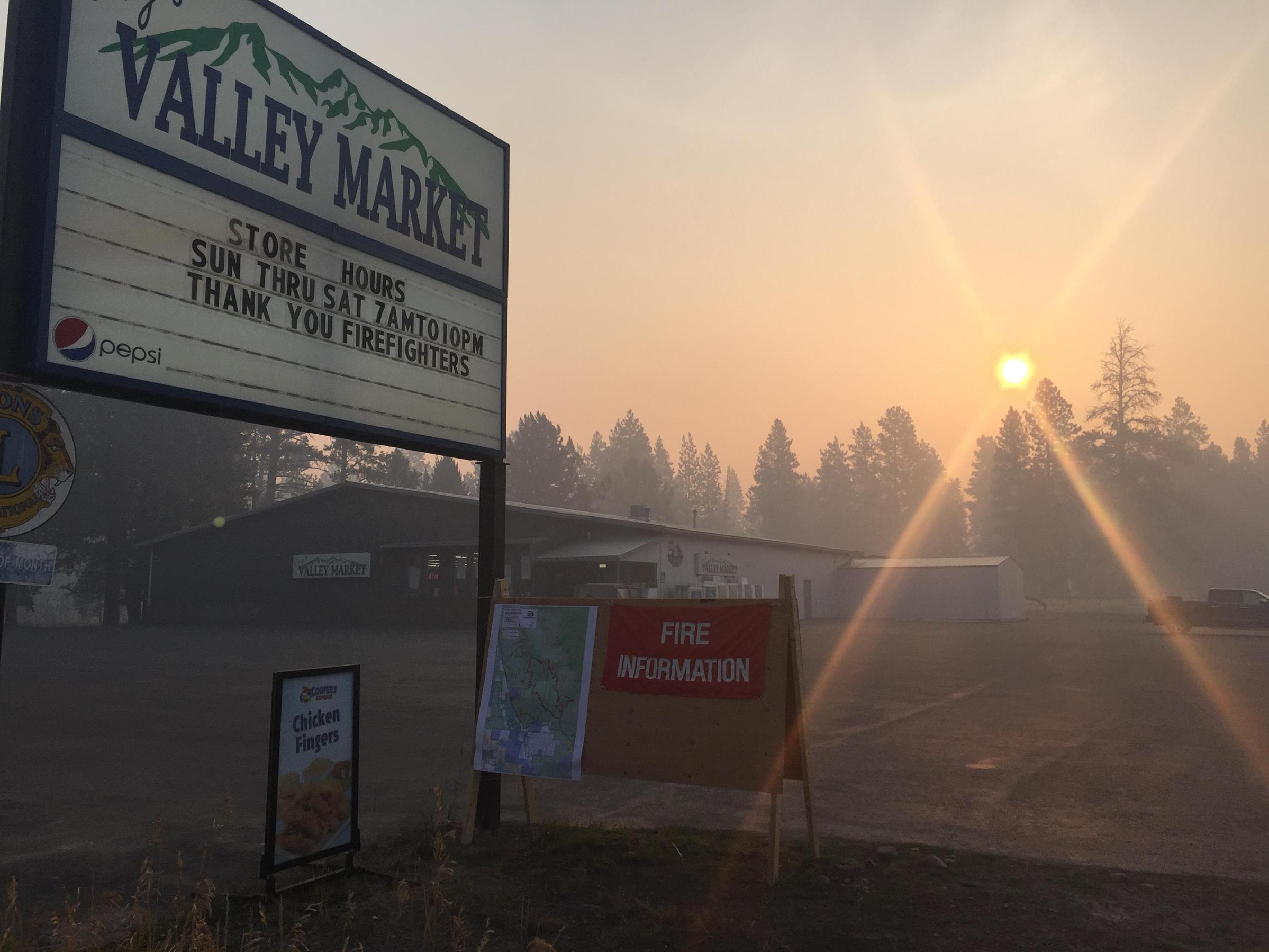 Wildfire smoke filled the sky in Seeley Lake, Mont. on Aug. 7, 2017. Weather effects concentrated the accumulating smoke, chronically exposing residents to harmful substances in the air. (InciWeb)