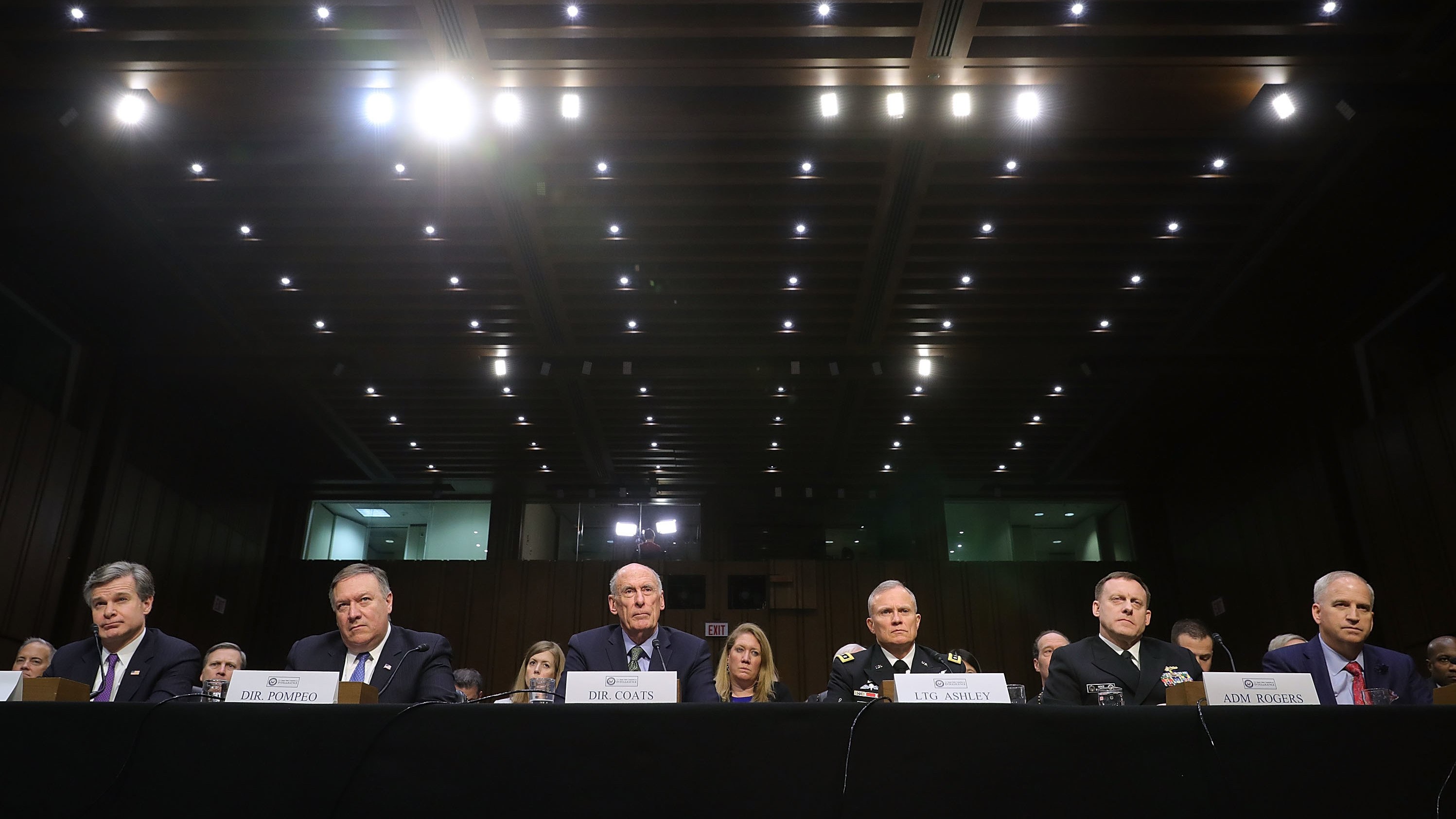 FBI Director Christopher Wray (from left), CIA Director Mike Pompeo, Director of National Intelligence Dan Coats, Defense Intelligence Agency Director Lt. Gen. Robert Ashley, NSA Director Adm. Michael Rogers and National Geospatial-Intelligence Agency Director Robert Cardillo testify before the Senate intelligence committee on Tuesday. (Getty Images)