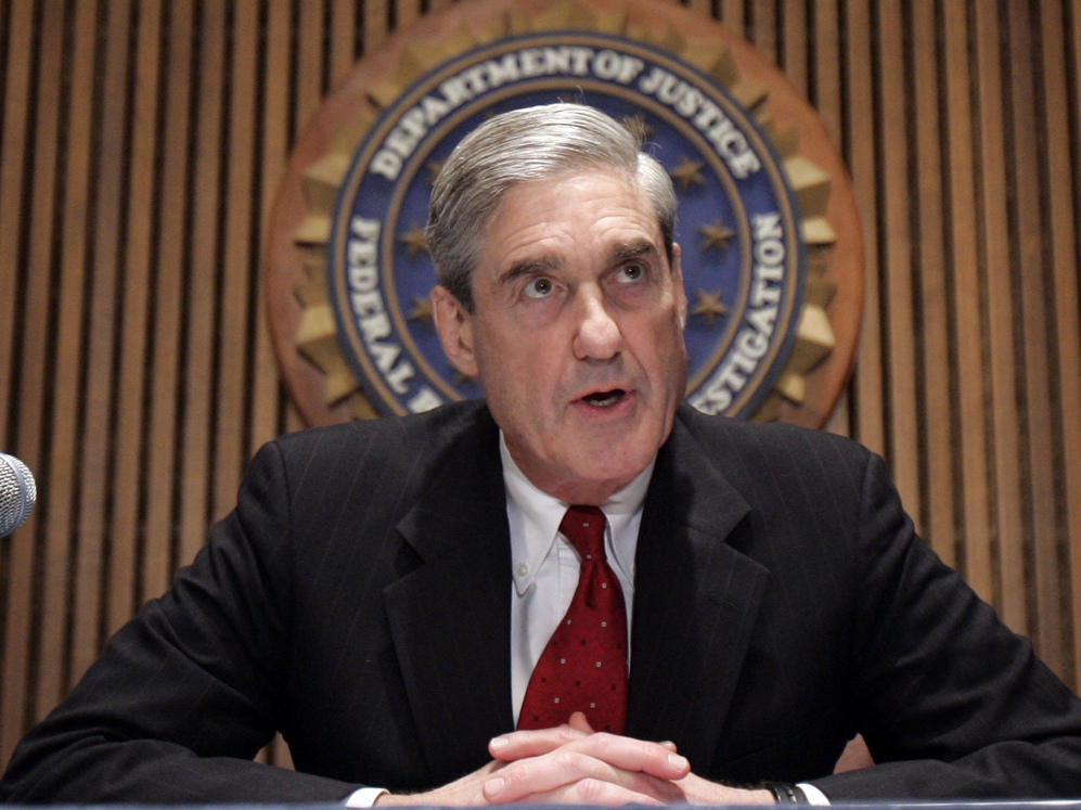 The office of Justice Department special counsel Robert Mueller says 13 Russians and three Russian entities took part in a broad information war against the United States. (AP)
