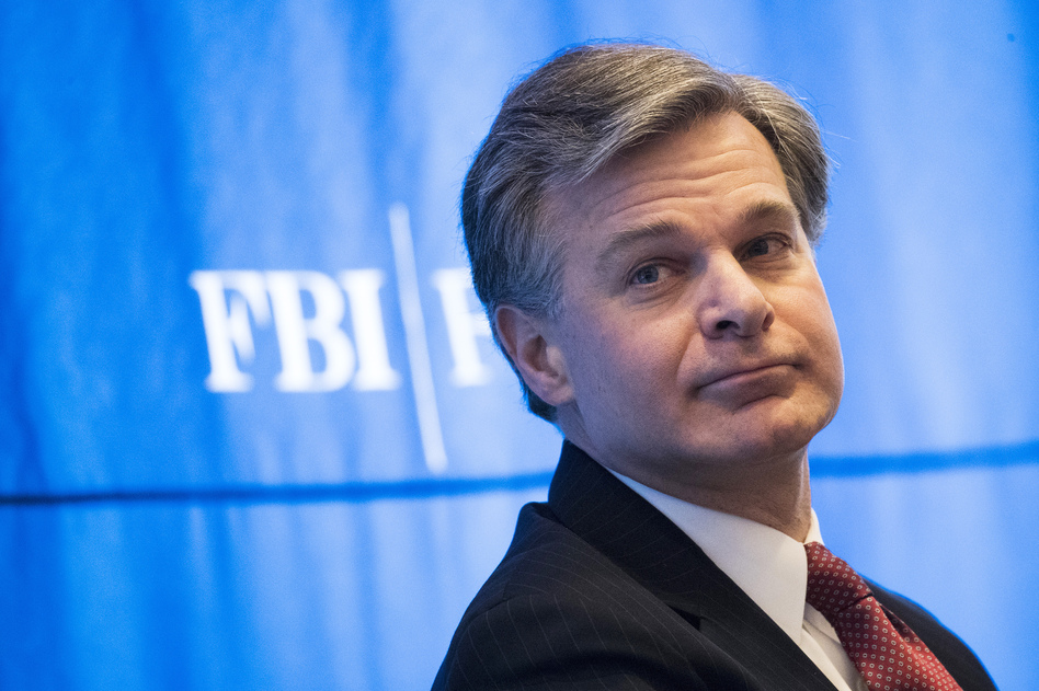 FBI Director Christopher Wray attends the International Conference on Cyber Security on Jan. 9. The FBI says that someone called its tip line to report concerns about Nikolas Cruz, who has told police he killed 17 people in Parkland, Fla. But the bureau failed to follow protocols to assess the threat. (Drew Angerer/Getty Images)