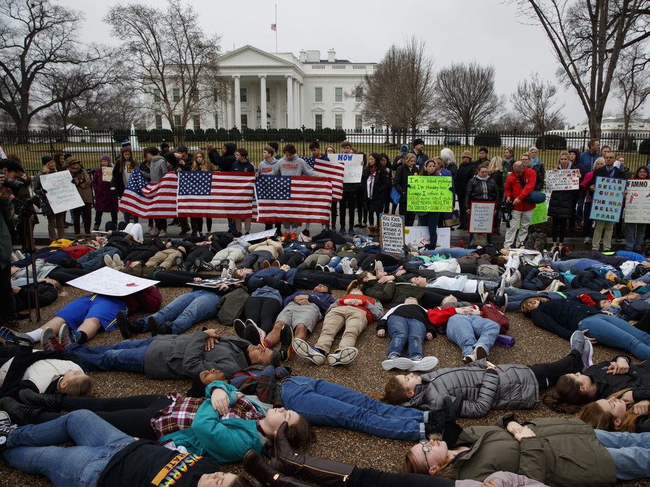 Demonstrators participate in a "lie-in" during a protest in favor of gun control reform in front of the White House. Grassroots groups are planning hundreds more protests in coming weeks. (Evan Vucci/AP)