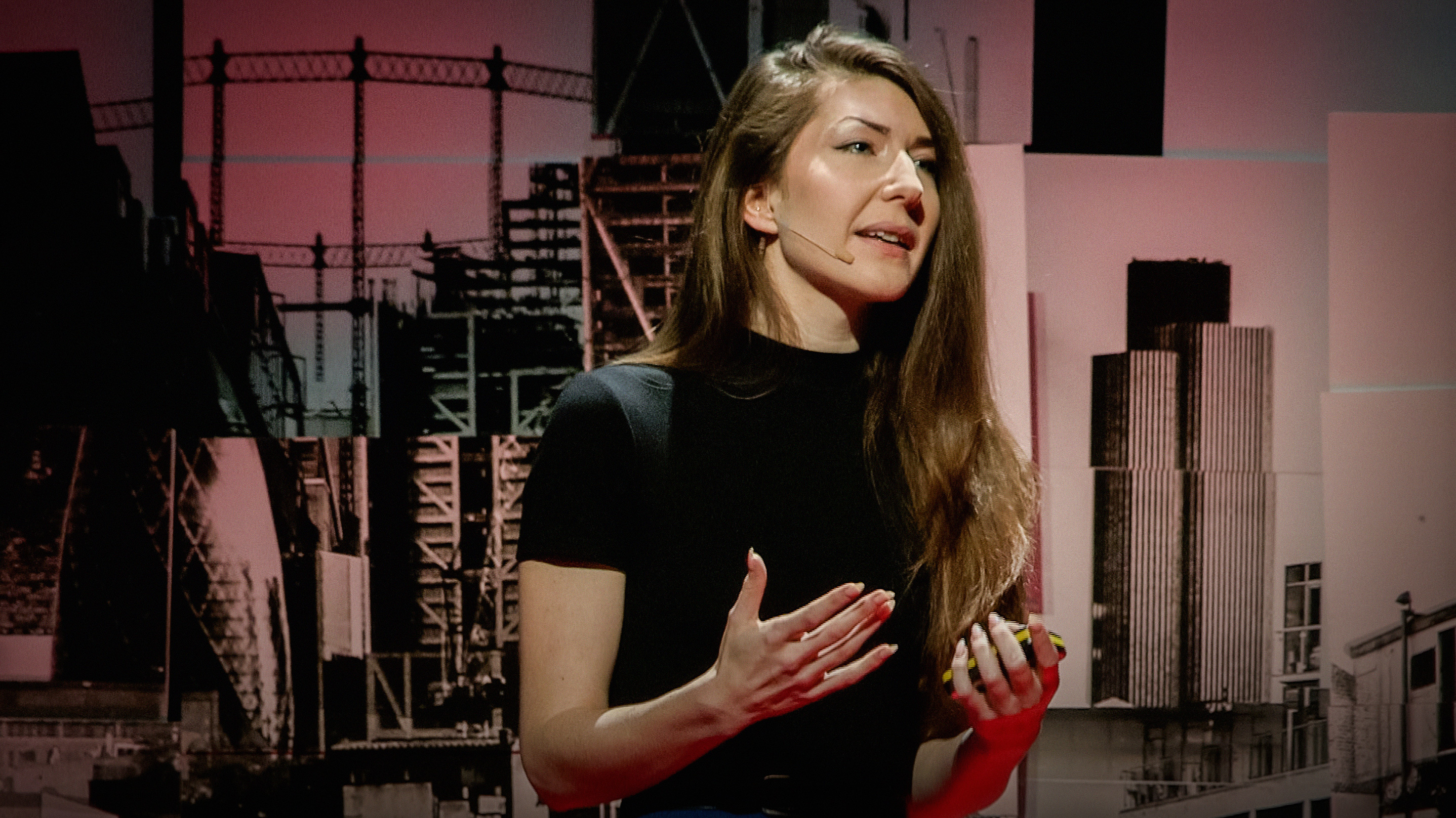 Juno Mac on the TED stage.
