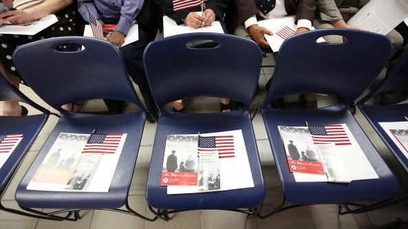Citizenship candidates wait for a naturalization ceremony to begin in downtown Manhattan on July 2, 2013 in New York City. U.S.