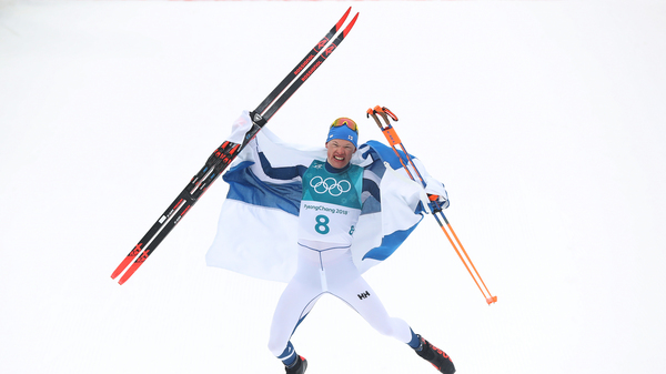 Cross-country skier Iivo Niskanen of Finland celebrates winning the men