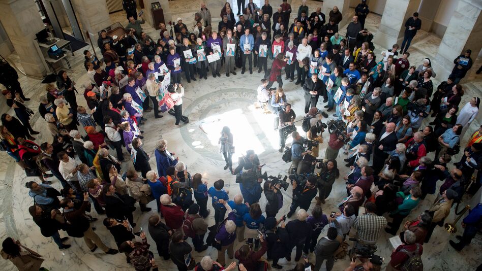 Immigrant rights advocates, seen here at the Capitol last week, say they are keeping pressure on President Trump and Congress to act on the DACA program. (Saul Loeb/AFP/Getty Images)