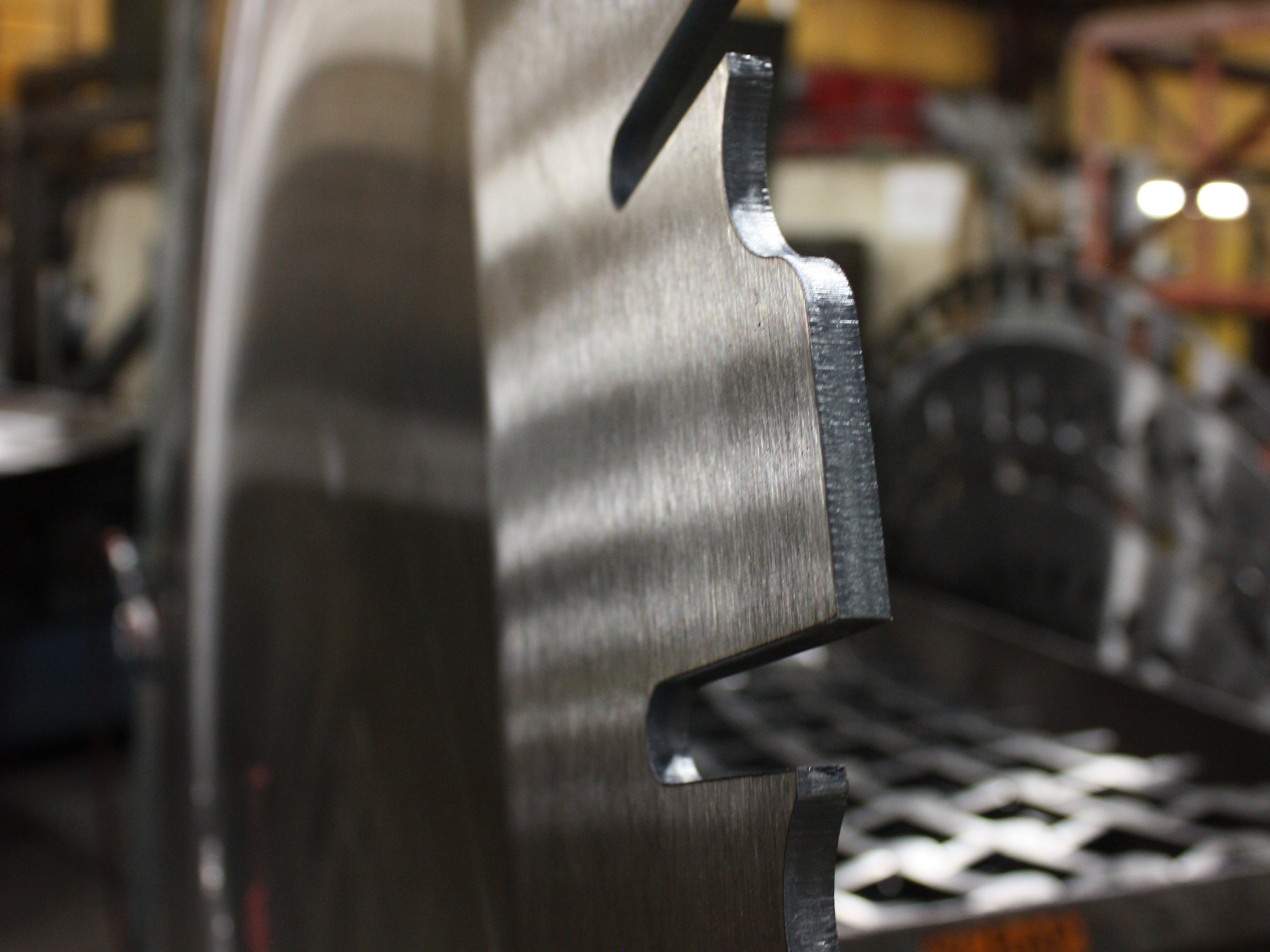 The finished edge of a saw blade produced by Simonds International in Big Rapids, Mich. The blades require steel not available from U.S. mills. (Interlochen Public Radio)