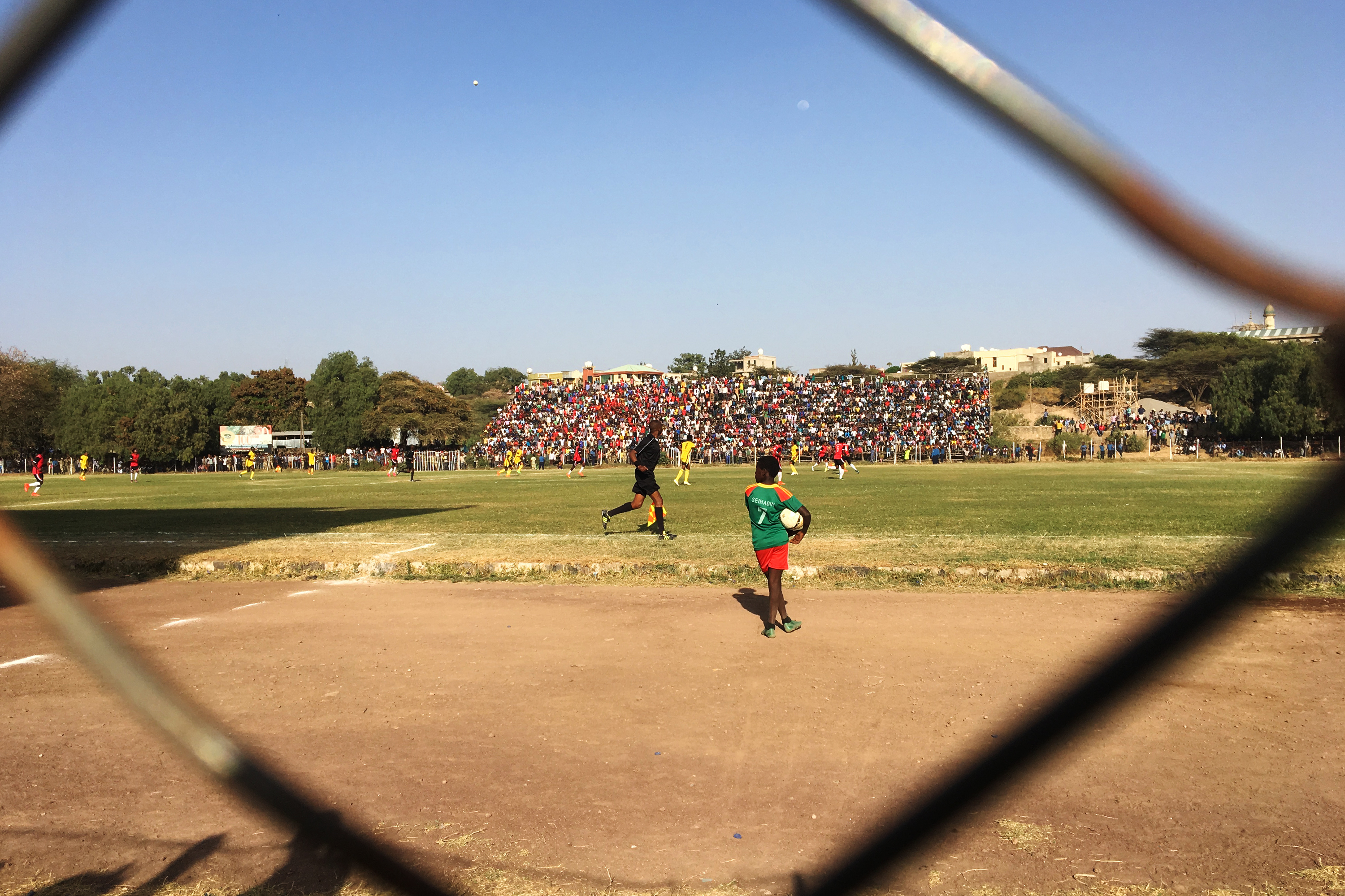 Ethiopian teams Adama City and Welwalo Adigrat University play in a soccer match. Stadiums have become battlefields and teams have become a proxy for the political divisions in the country. (NPR)
