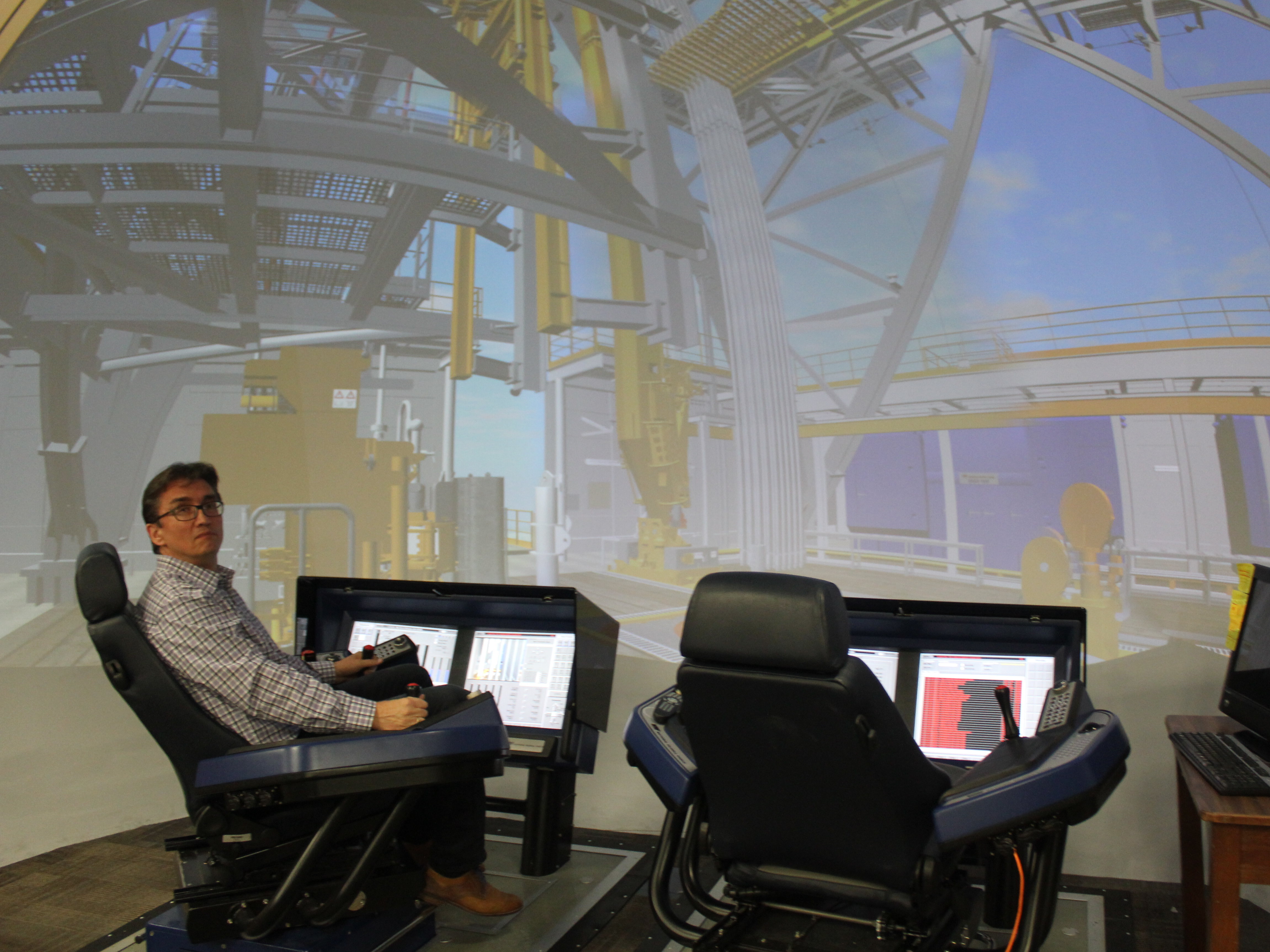 Professor Eric van Oort uses this 'virtual oil rig' to do research at the University of Texas at Austin. He helps advise companies on how to improve operations. (KUT)