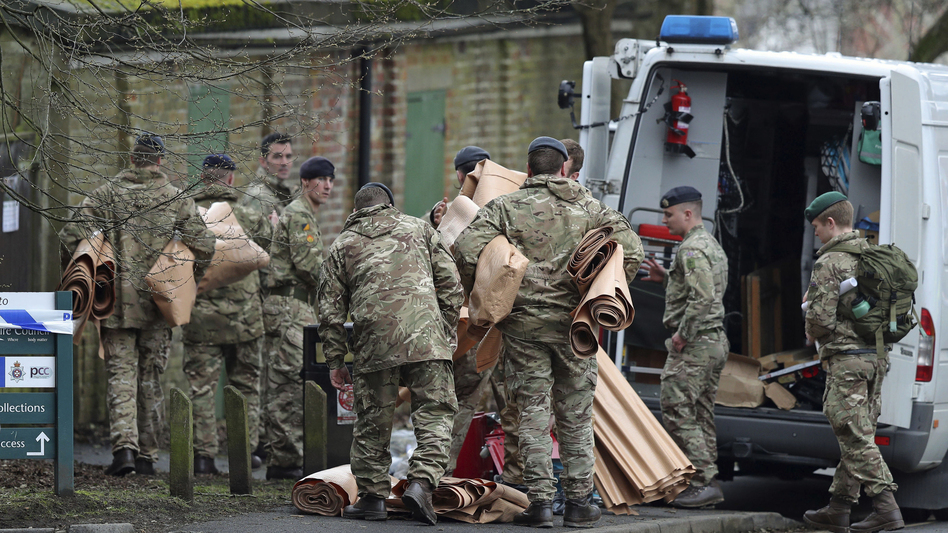 Military personnel outside Bourne Hill police station in Salisbury, England, Sunday, as police and members of the armed forces probe last week's suspected nerve agent attack on Russian double agent spy Sergei Skripal. (Andrew Matthews/AP)