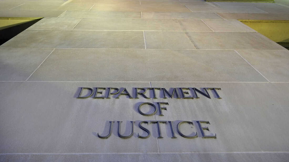 The Department of Justice headquarters building in Washington photographed early in the morning.