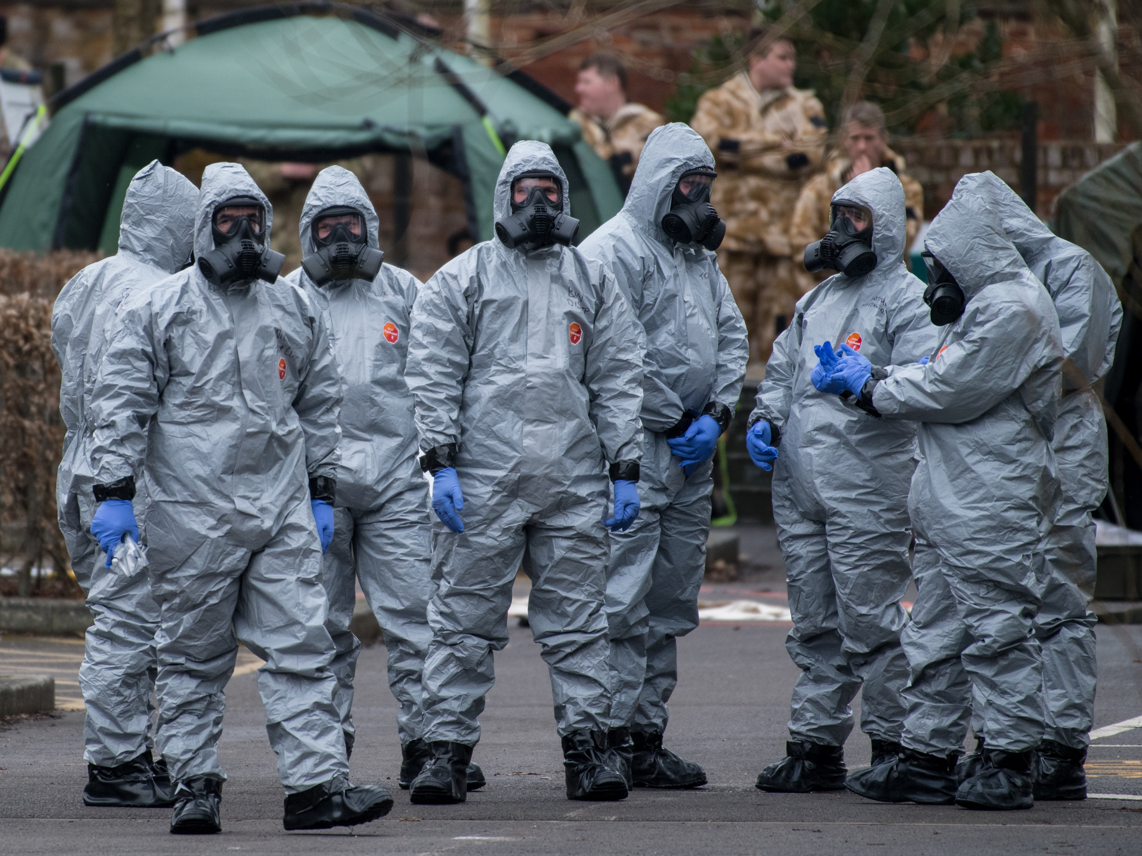 Military personnel wearing protective suits investigate the poisoning of Sergei Skripal in Salisbury, England. Skripal and his daughter, Yulia, remain critically ill. (Getty Images)