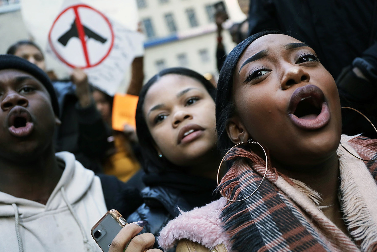 Students from surrounding schools gather at Zuccotti Park in lower Manhattan to mark one month since the high school shooting in Parkland, Florida. (Getty Images)