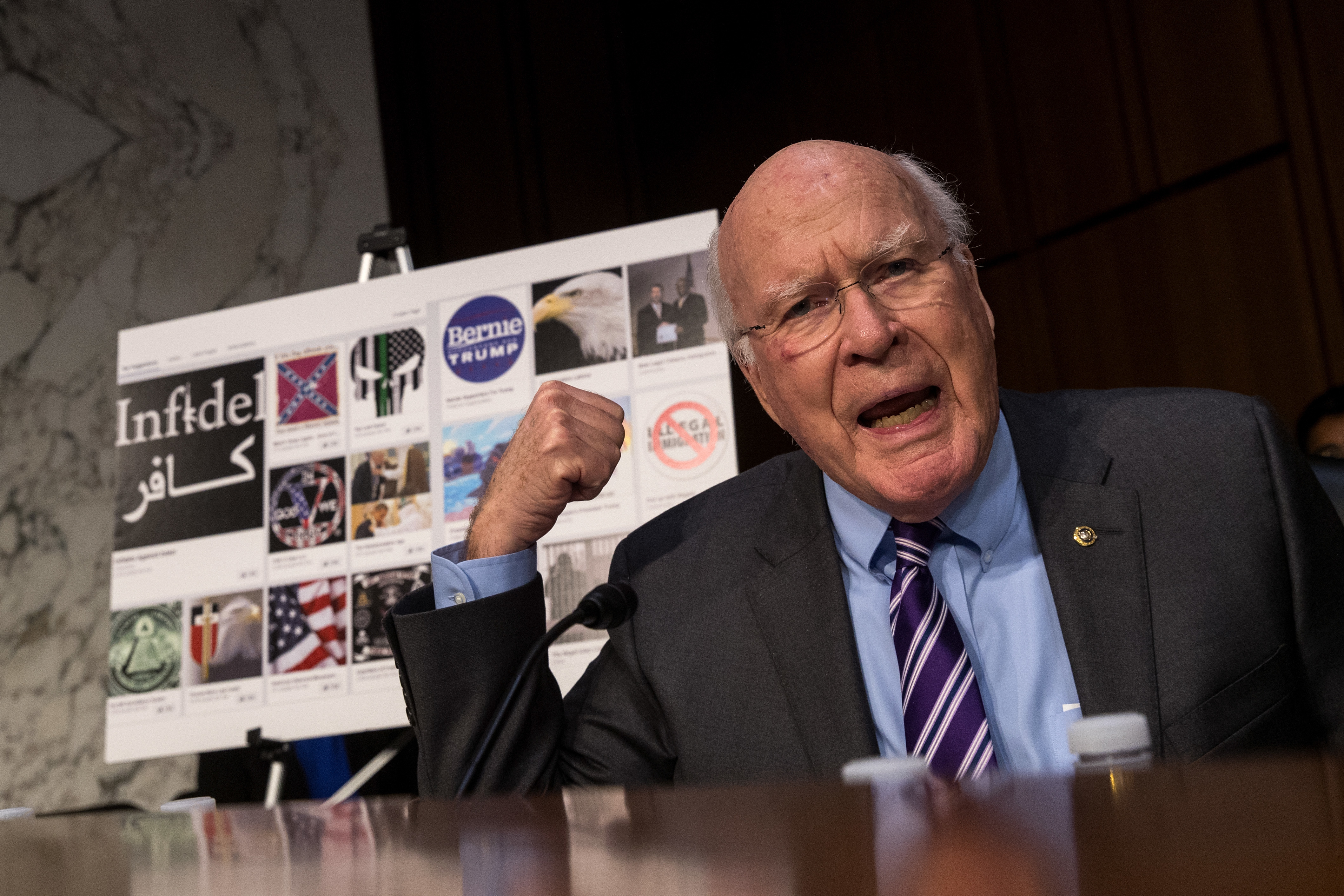 With examples of Russian-created Facebook pages behind him, Sen. Patrick Leahy, D-Vt., questions witnesses during a 2017 Senate hearing on Russian-backed ads on social media in the 2016 election. Now, the Federal Election Commission is looking into increasing disclosure requirements for online ads. (Getty Images)