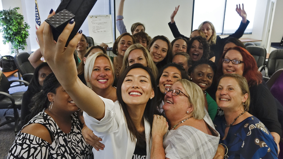 At the final session in a six-month political candidate training series called Emerge Virginia, Johanna Shin takes a group photo. (The Washington Post/Getty Images)