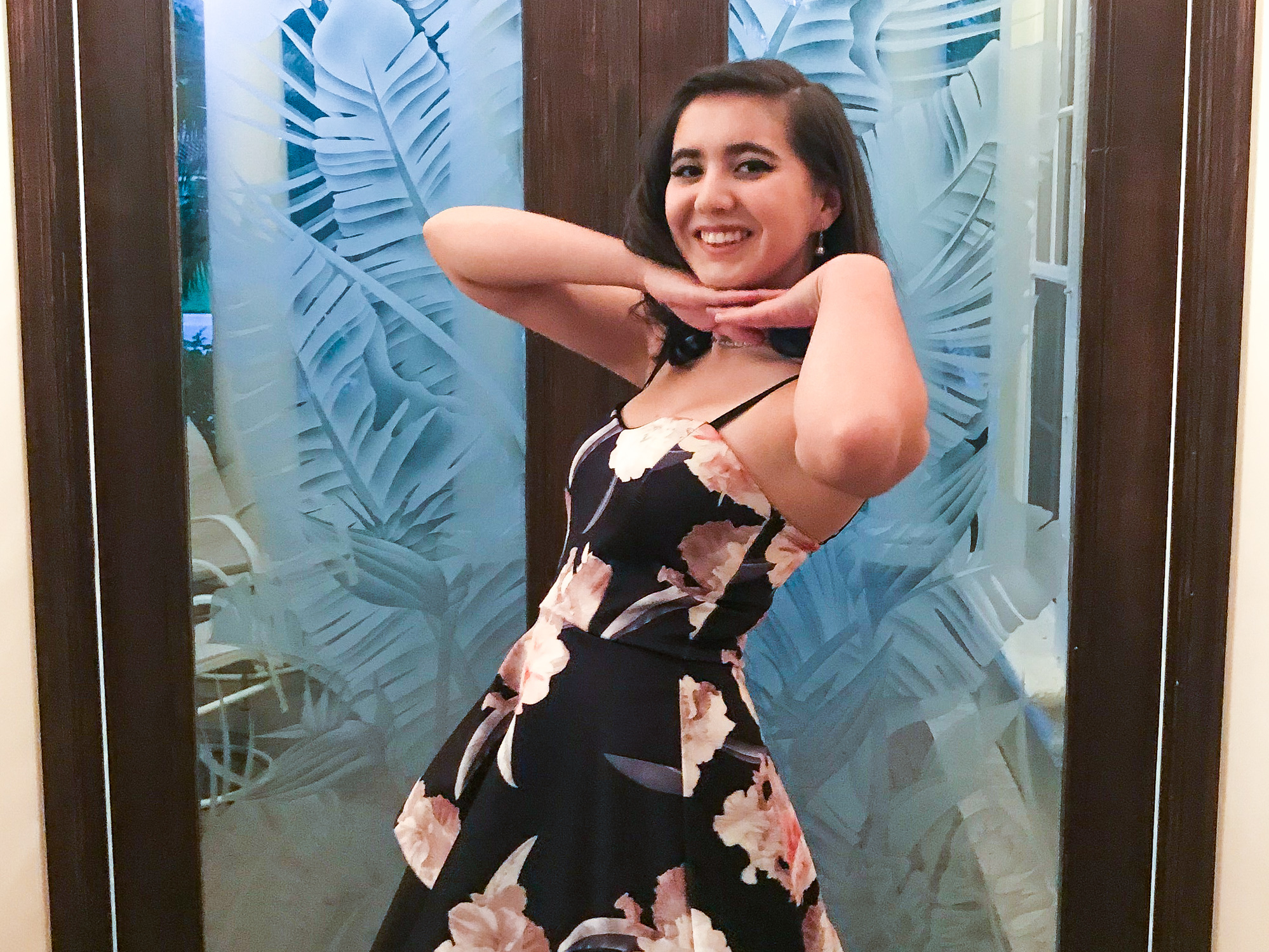 Carmen strikes a pose for her younger sister, Evelyn, before homecoming in the fall of 2017. (Couresy of the Schentrup family)