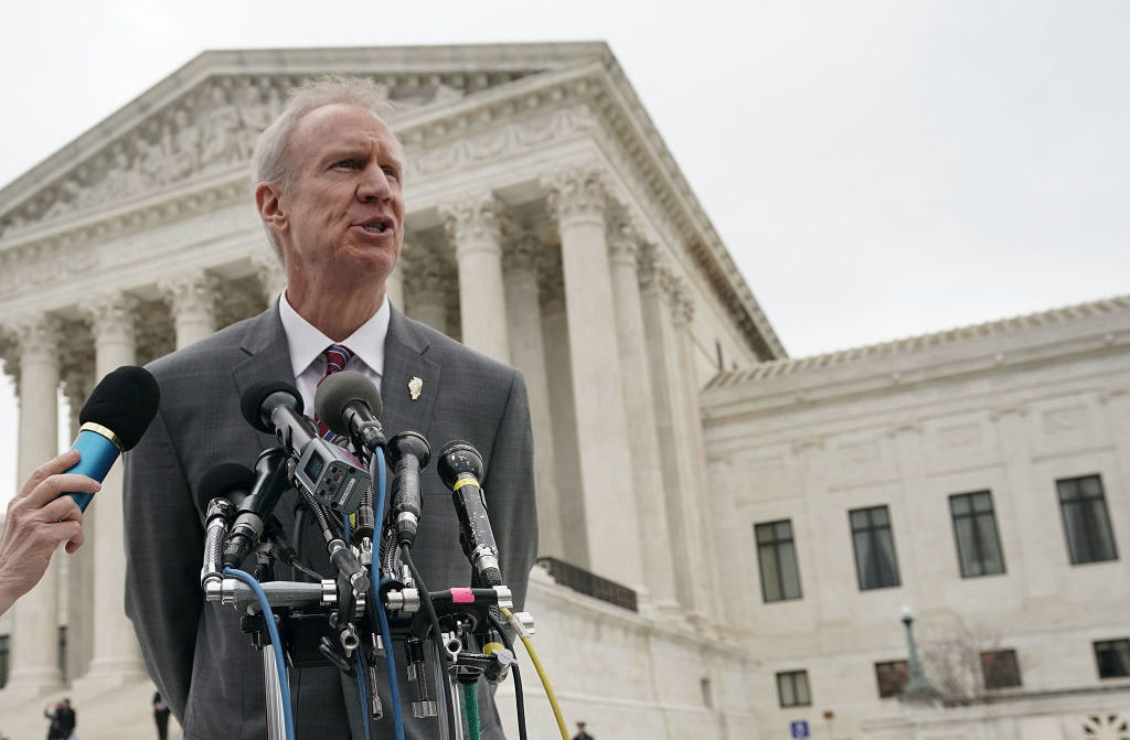 Gov. Bruce Rauner, R-Ill., speaks to members of the media in front of the U.S. Supreme Court after a hearing earlier this year. (Alex Wong/Getty Images)