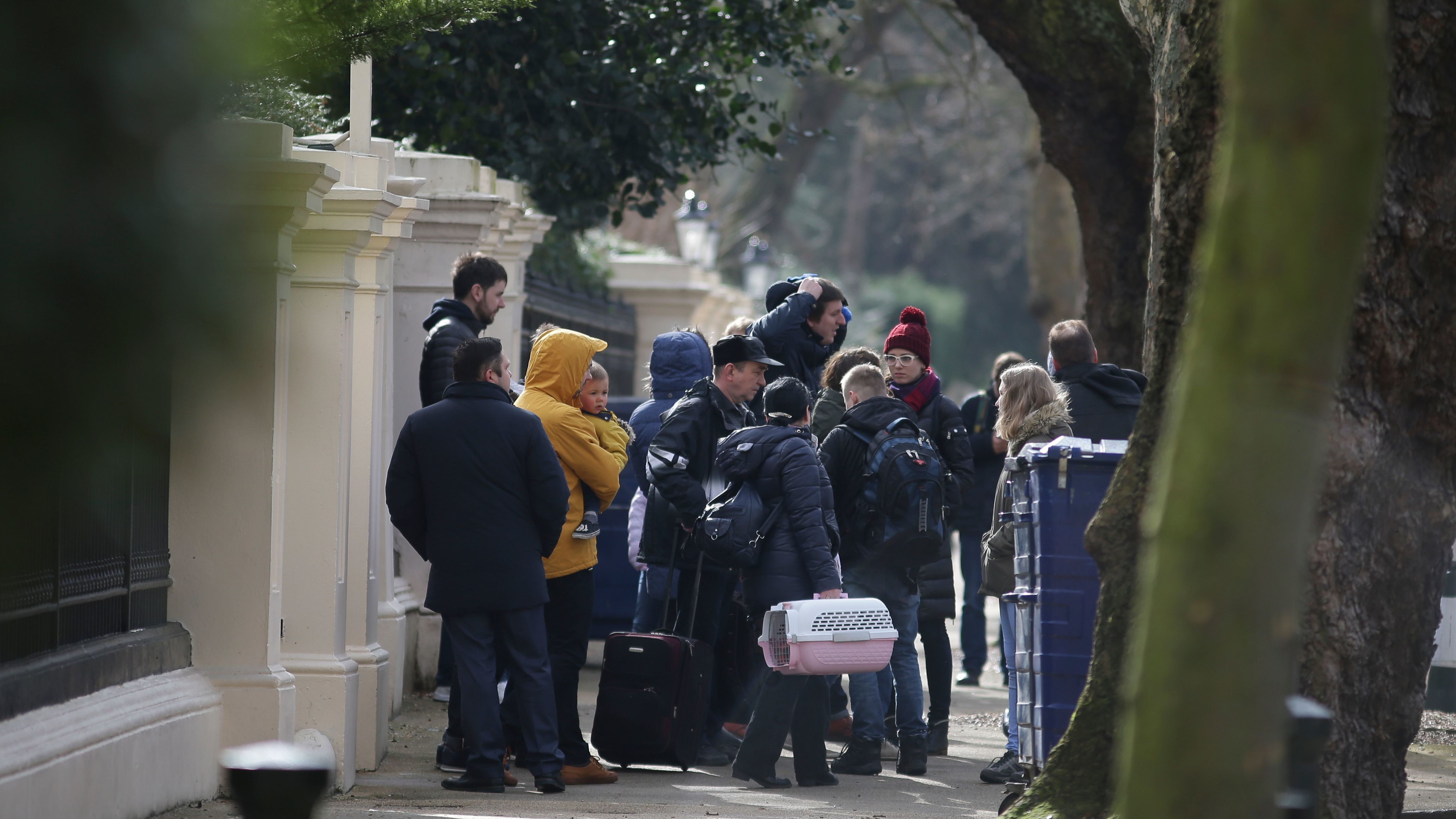 A small crowd gathered outside the Russian Embassy in London on Tuesday, as the nearly two dozen Russian diplomats returned to their country under a mandate from the British government. The U.K. expelled the diplomats in retaliation for the spy poisoning case earlier this month. (AFP/Getty Images)