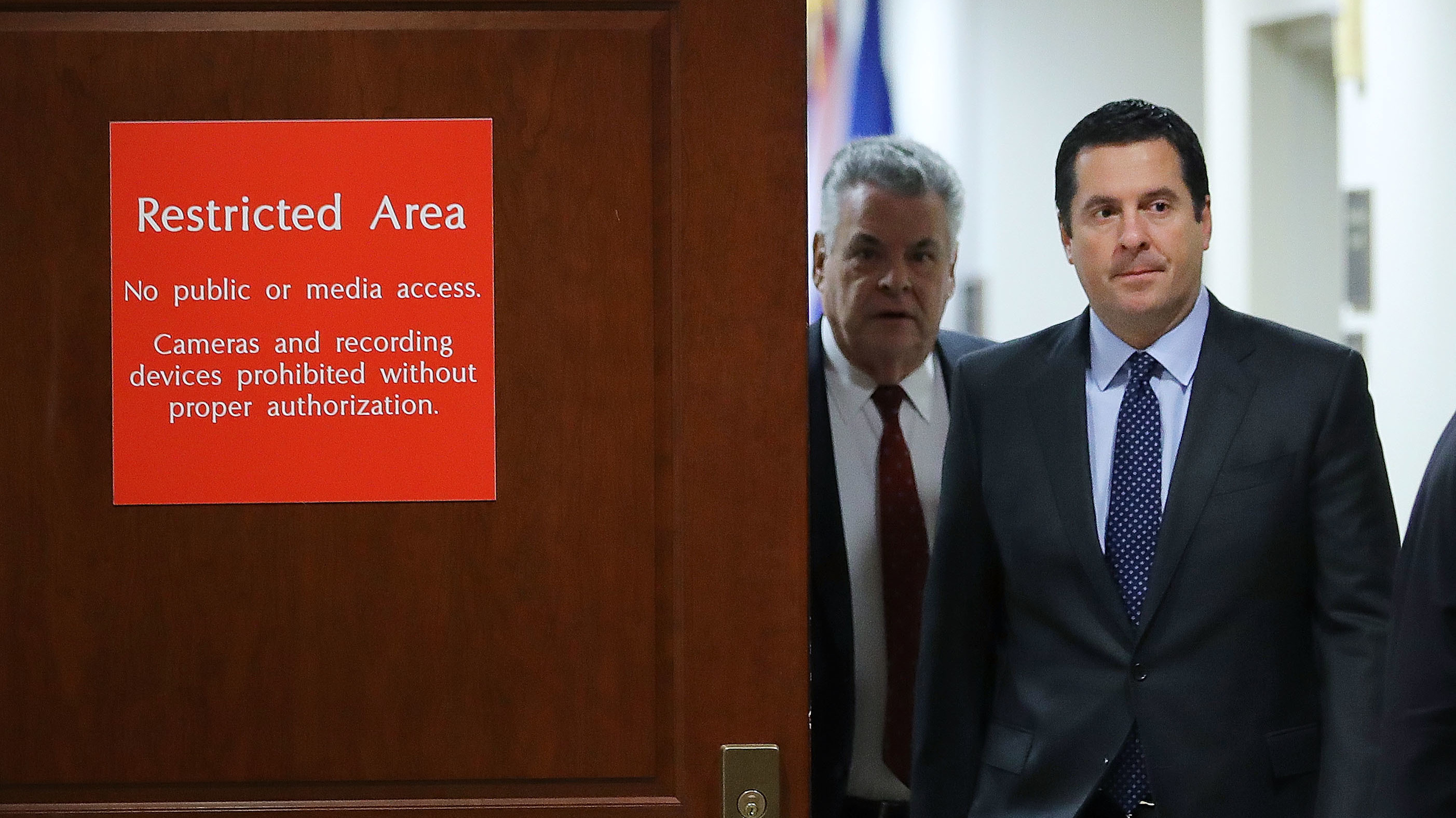 House intelligence committee Chairman Devin Nunes, R-Calif., leaves the committee's secure meeting rooms at the U.S. Capitol on February 6, 2018, followed by Rep. Peter King, R-N.Y. (Getty Images)