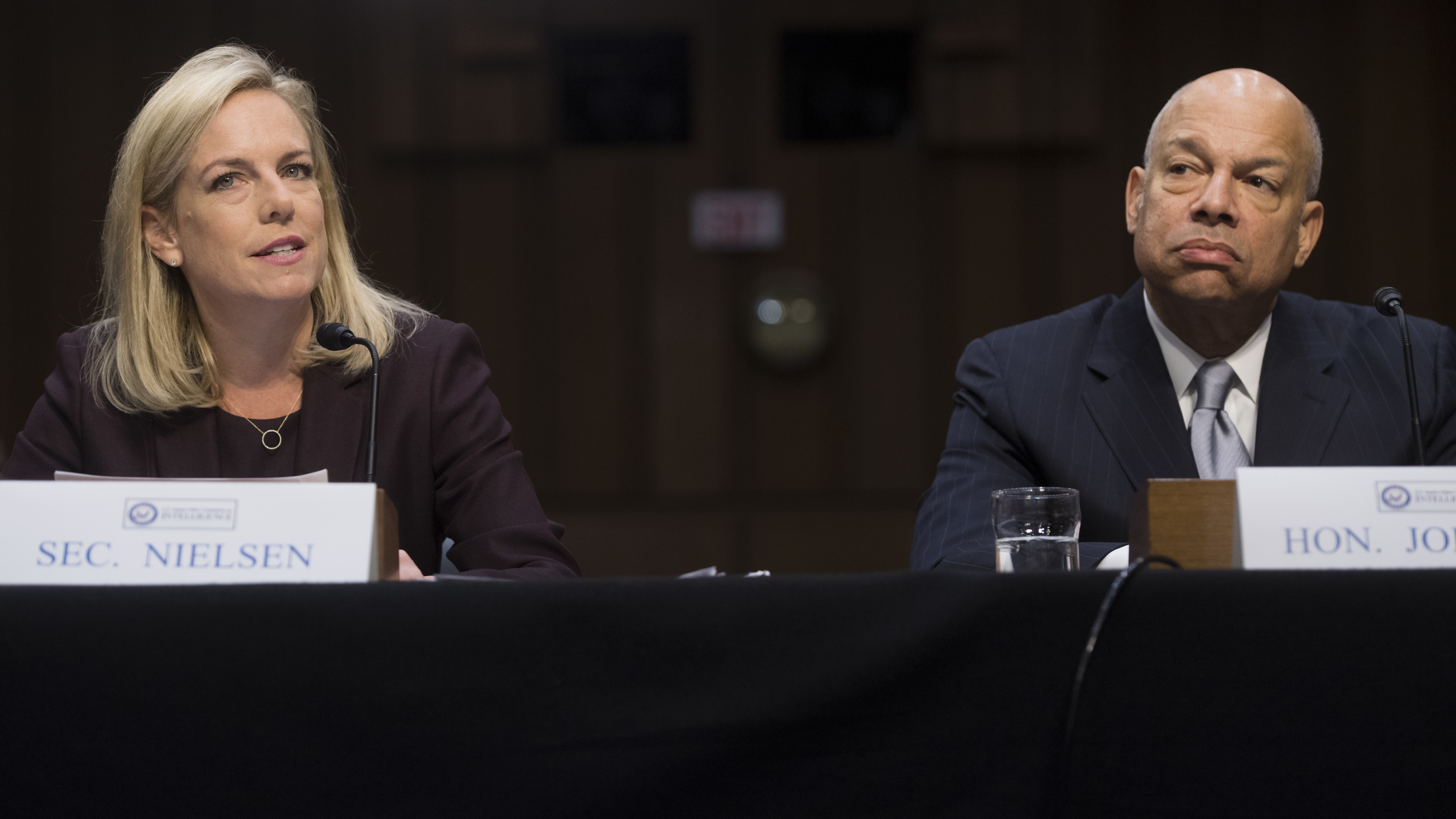 Secretary of Homeland Security Kirstjen Nielsen (left) and former Secretary of Homeland Security Jeh Johnson (right) testify about election security during a Senate intelligence committee hearing on Capitol Hill Wednesday. (AFP/Getty Images)