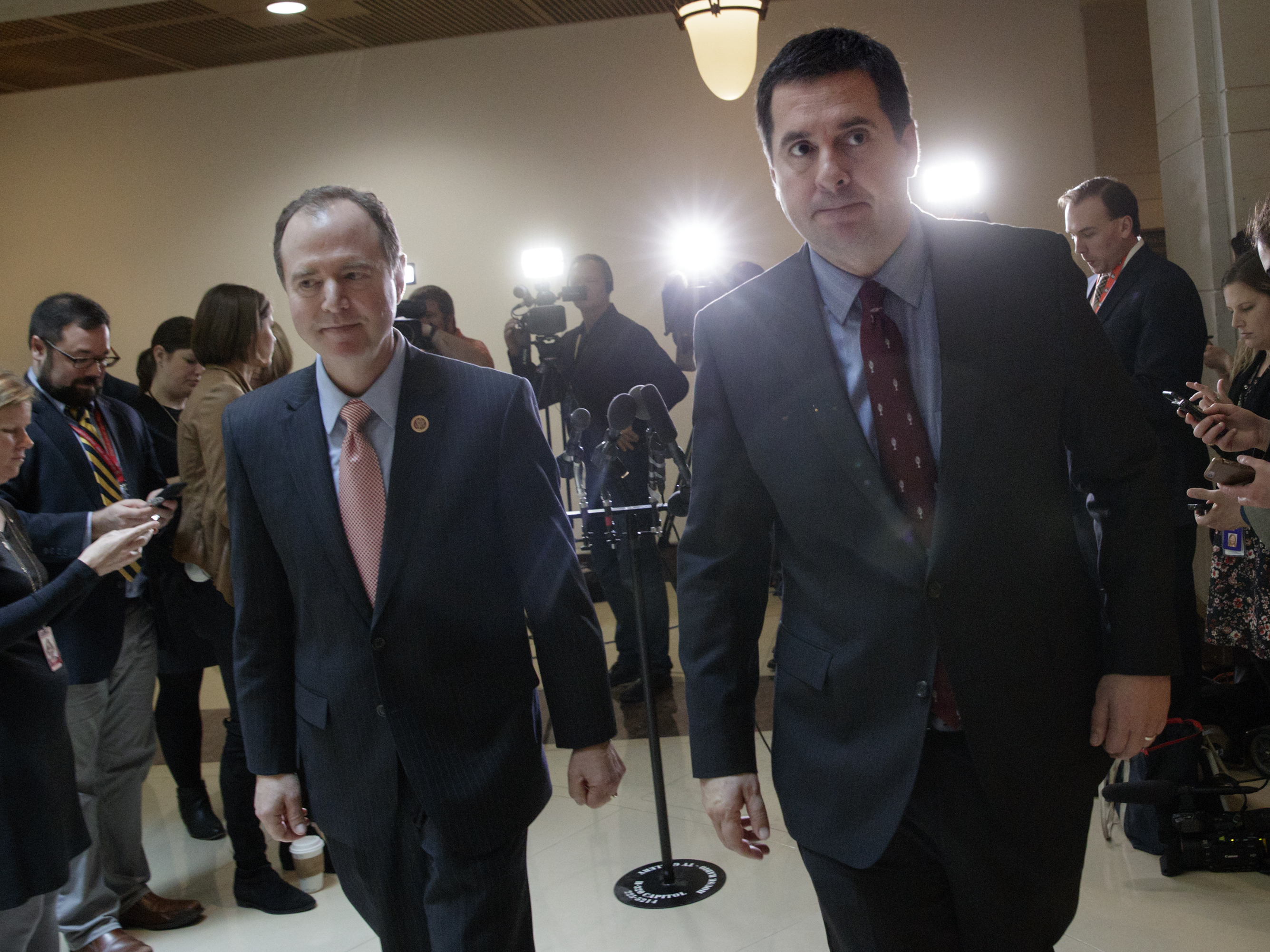 House intelligence committee Ranking Member Adam Schiff, D-Calif. (left), and Chairman Devin Nunes, R-Calif., disagree over ending the committee's Russia investigation. (AP)