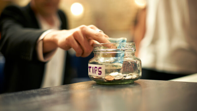 The busboy earns his tip