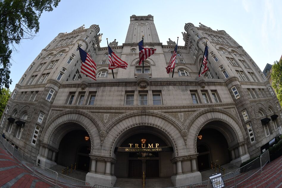 A lawsuit brought by the attorneys general of Maryland and the District of Columbia regarding President Trump's profits from the Trump International Hotel near the White House can proceed, a federal judge has ruled. (Paul J. Richards/AFP/Getty Images)
