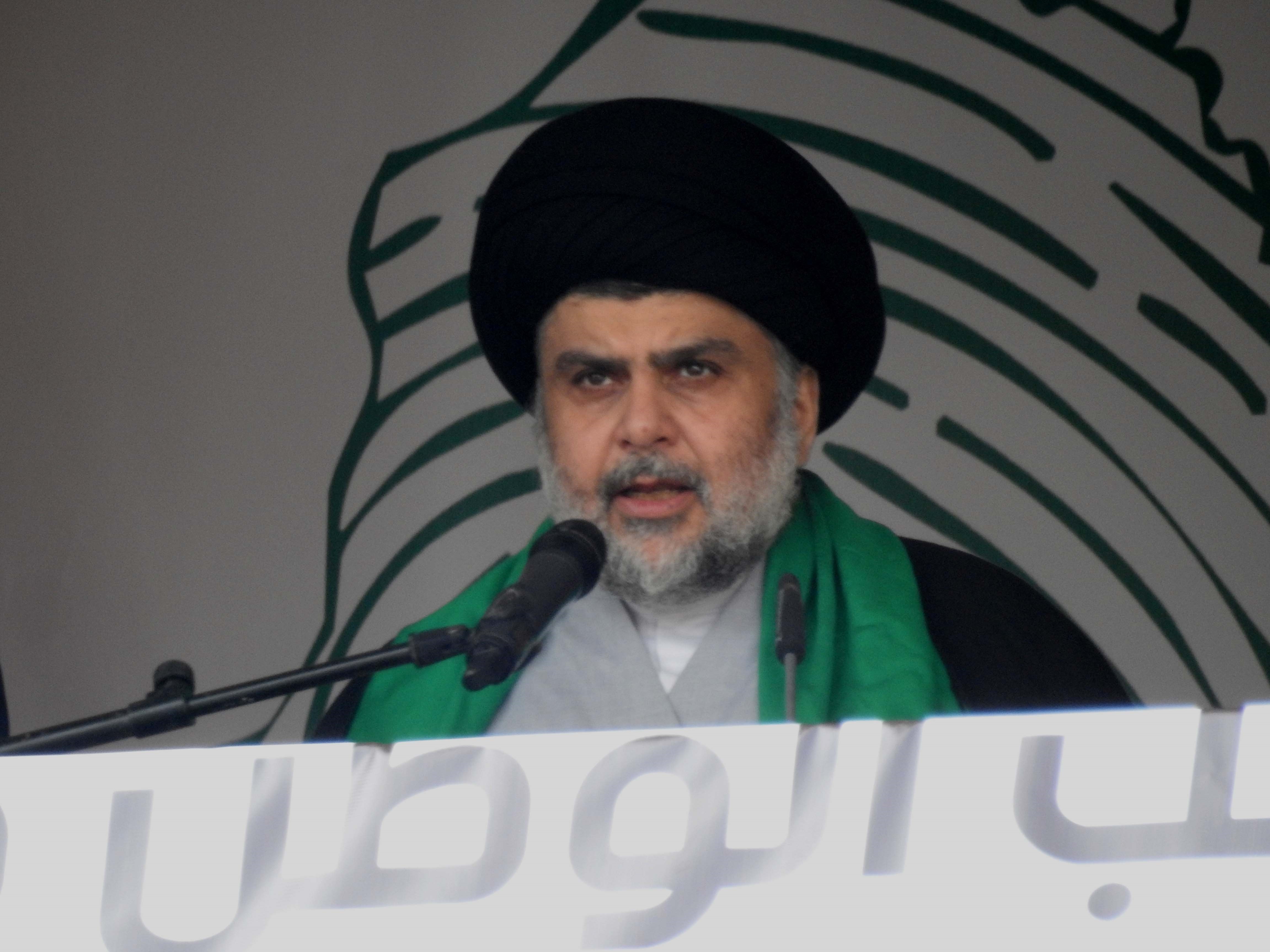 Iraqi Shiite cleric Muqtada al-Sadr addresses his supporters during a demonstration in Baghdad in 2017. He is now aligning himself with Communists ahead of Iraq's May election. (Getty Images)