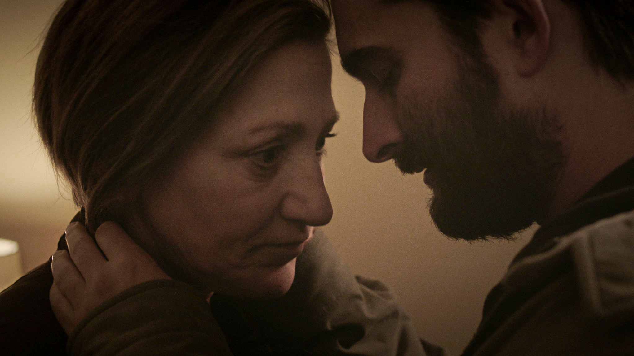 Carol (Edie Falco) and Chris (Jay Duplass) share an intimate moment in Lynn Shelton's <em>Outside In.</em> (The Orchard)