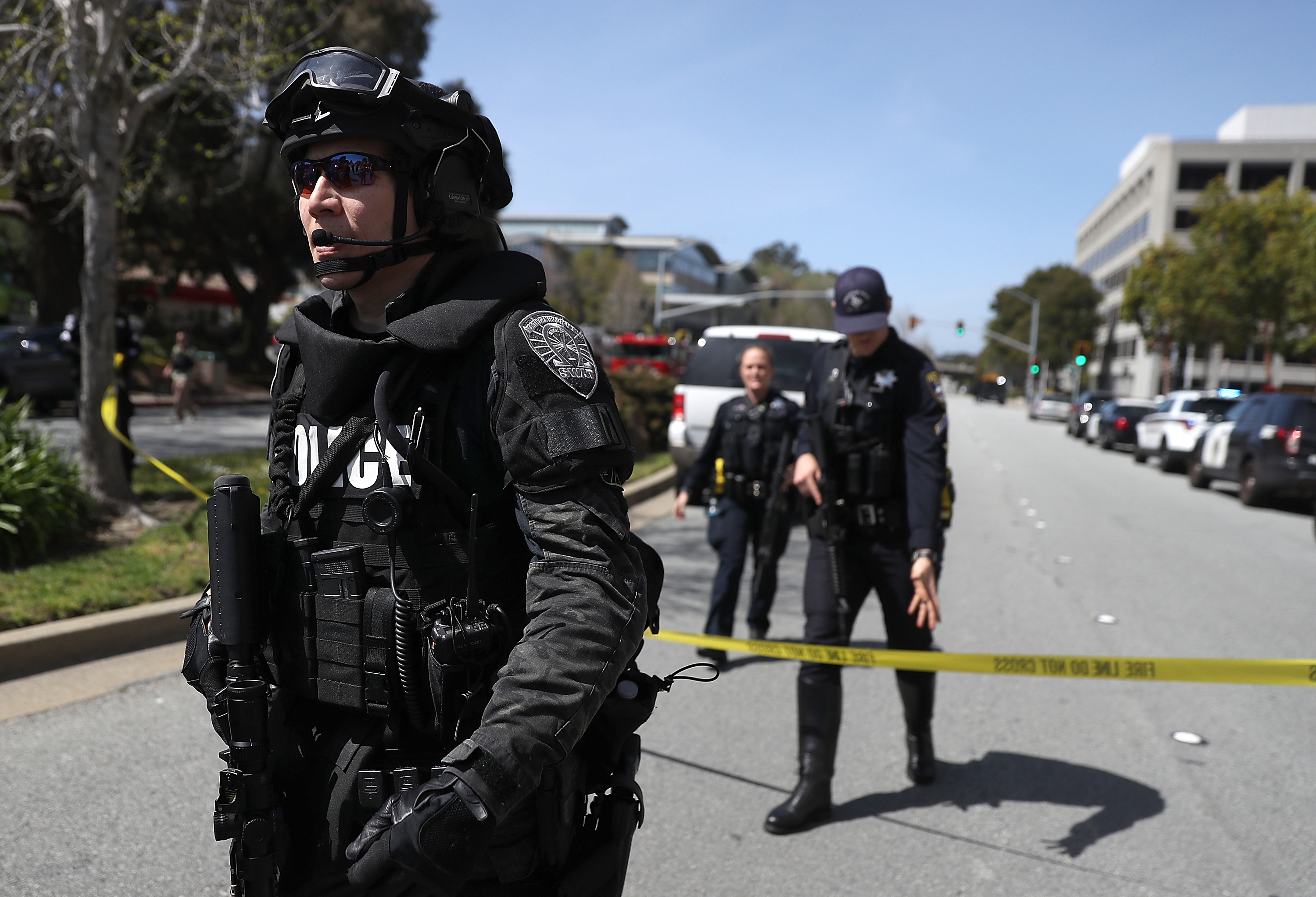 Law enforcement stands watch outside of the YouTube headquarters on Tuesday in San Bruno, Calif. Police are investigating an active shooter incident at YouTube headquarters that has left at least one person dead and several wounded. (Getty Images)