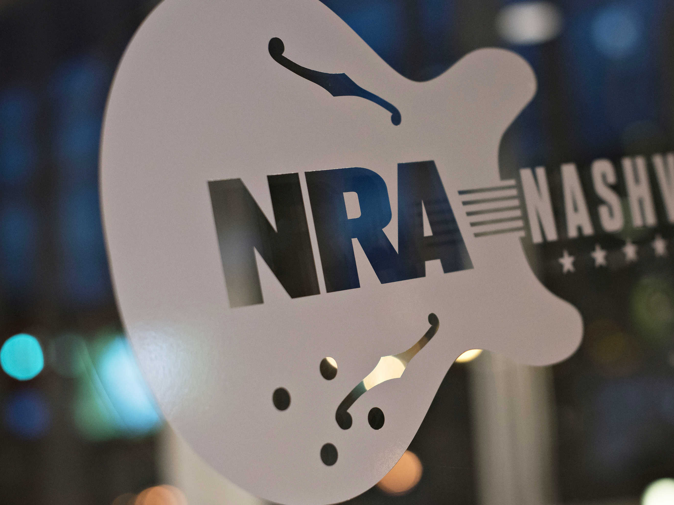 A sign touts the 144th National Rifle Association annual meetings and exhibits. The NRA may have more Russian or foreign members than it first acknowledged.