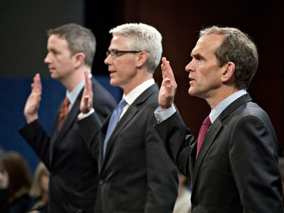 From right: Kent Walker, vice president and general counsel with Google Inc.; Colin Stretch, general counsel with Facebook Inc.; and Sean Edgett, acting general counsel with Twitter Inc., swear in to a House Intelligence Committee hearing in Washington, D.C., on Nov. 1, 2017. (Andrew Harrer/Bloomberg via Getty Images)