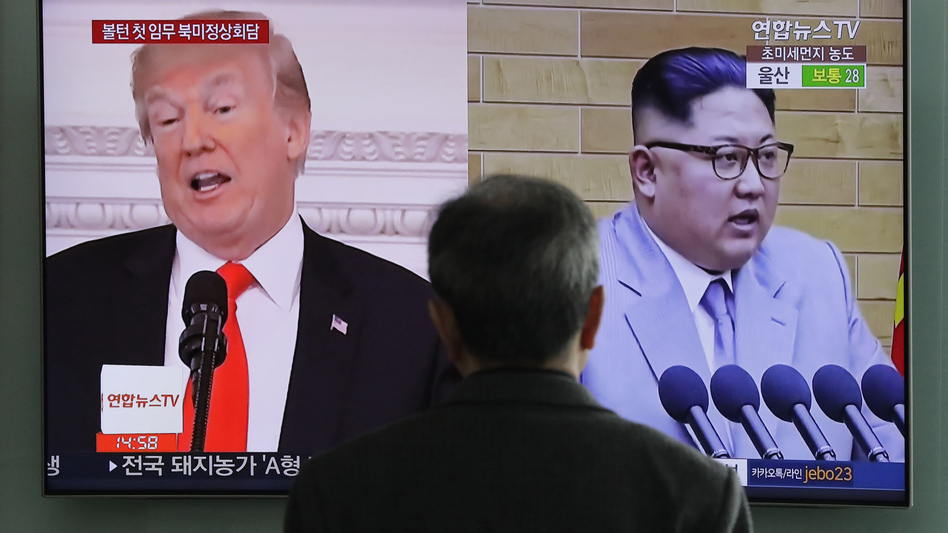 A man watches a TV screen showing archival video of President Trump and North Korean leader Kim Jong Un, during a news program at the Seoul Railway Station in Seoul, South Korea, last month. (Lee Jin-man/AP)