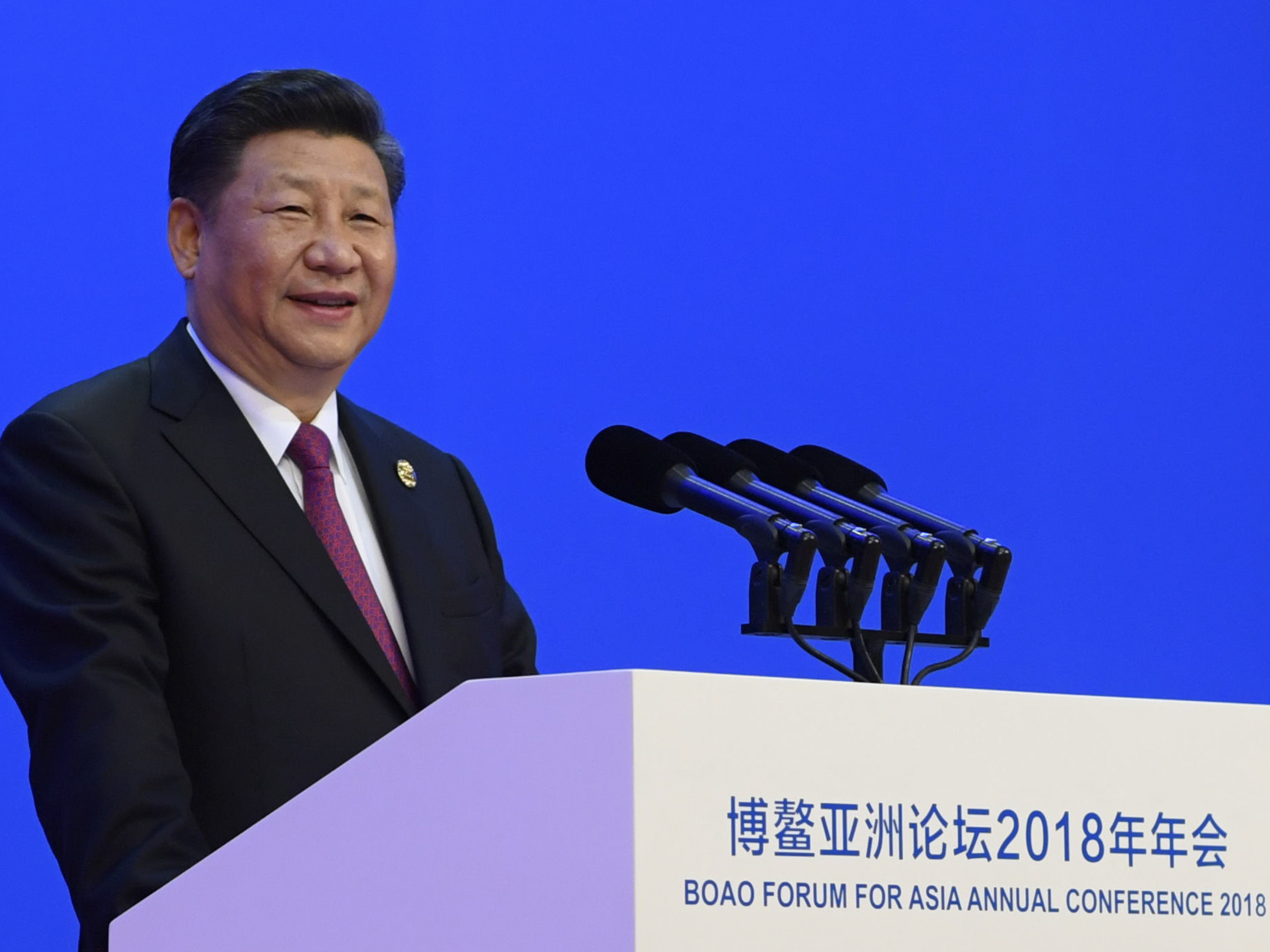 Xi says China to lower trade barriers as Beijing files WTO complaint against U.S.